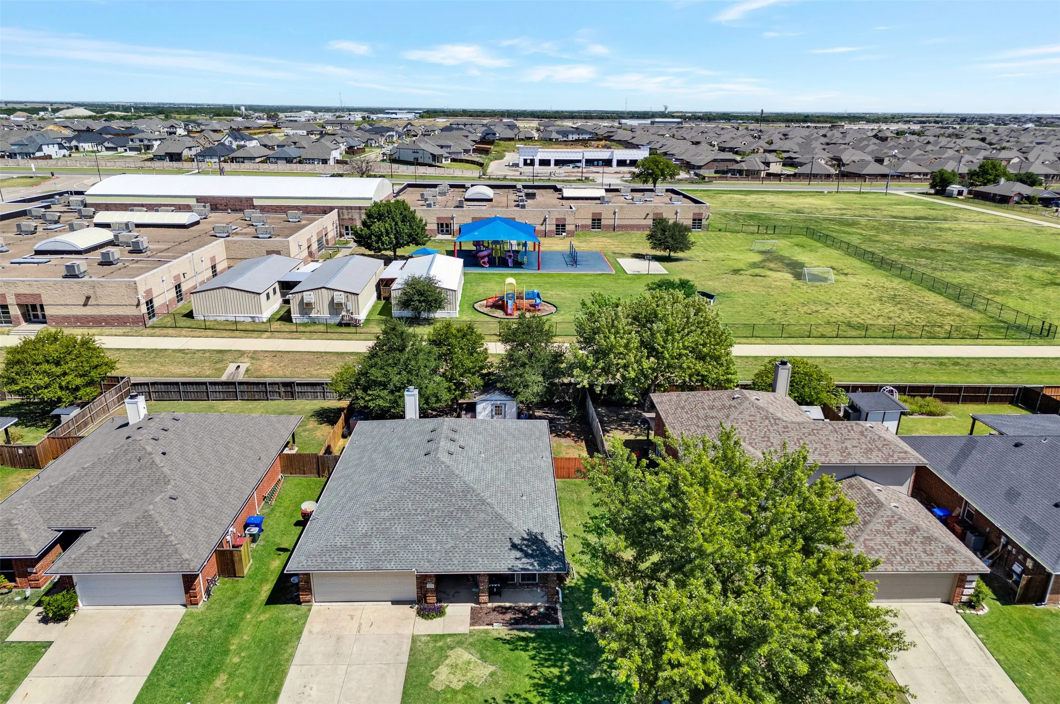 View of house with the Elementary School in the background