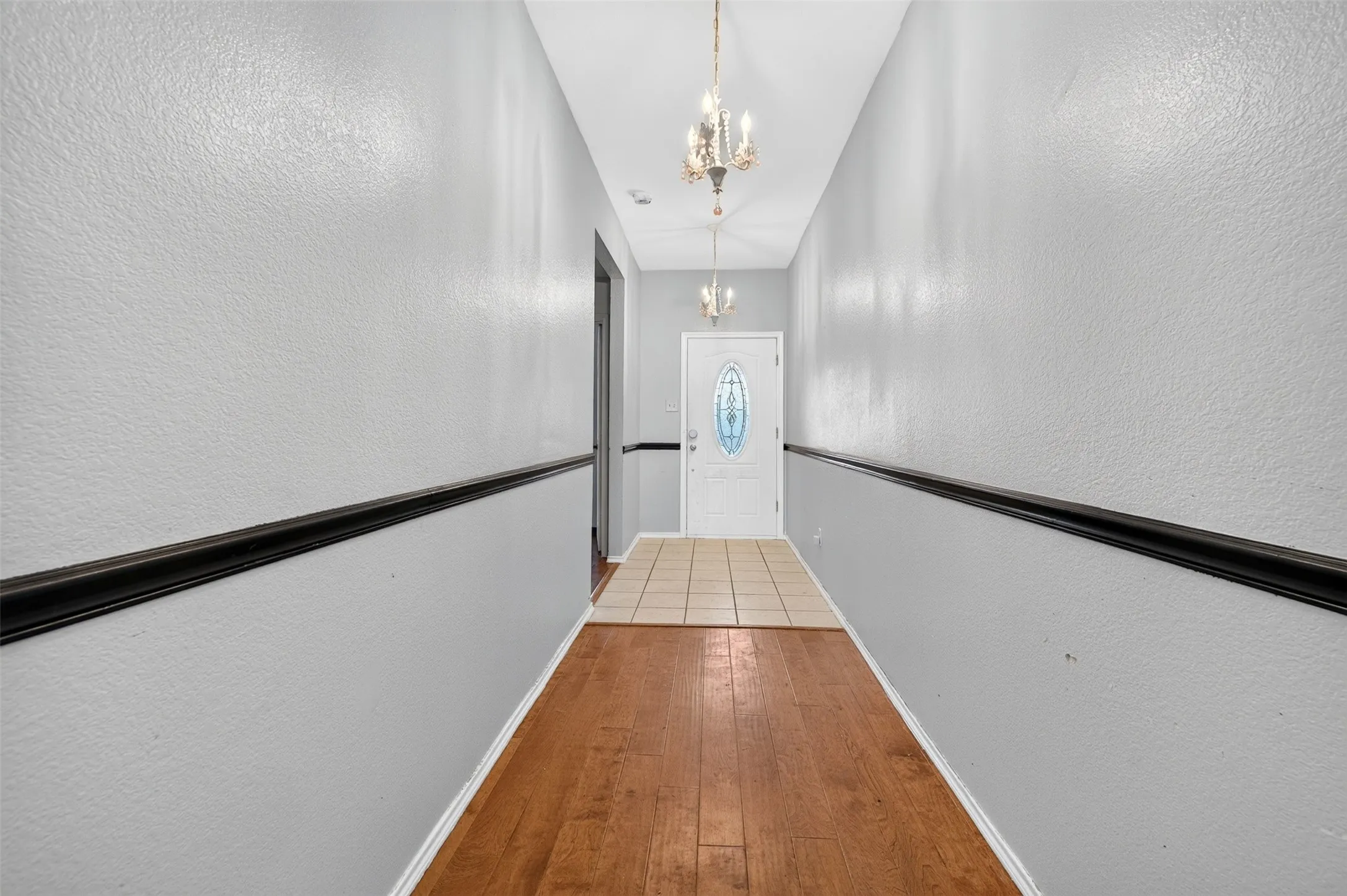 Just beyond the front door.
