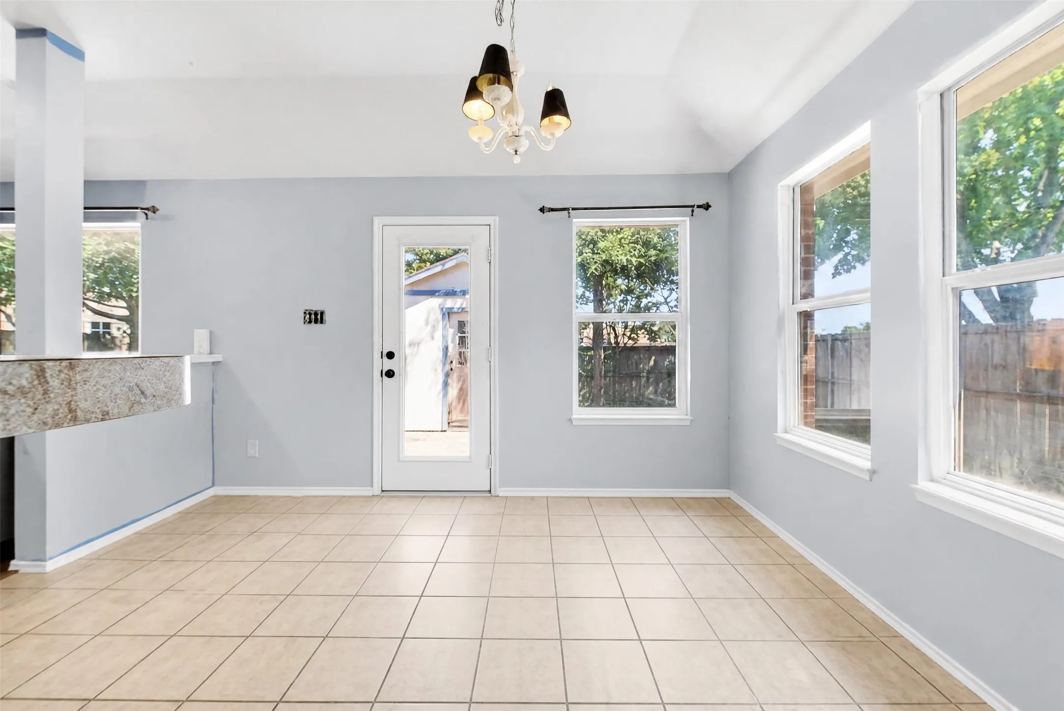 Dining Room connected to the Kitchen and open to the Living Room