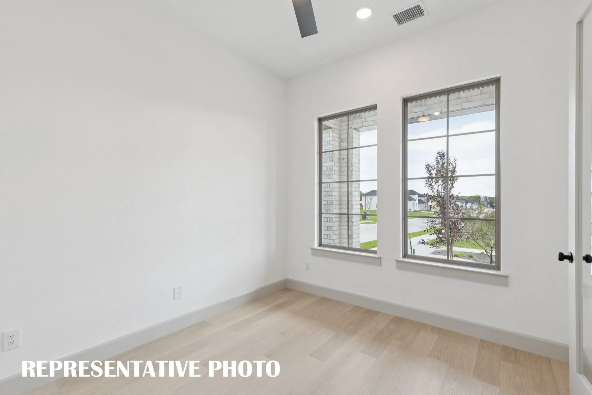 This light filled home office is the perfect place for the professional to work from home.  REPRESENTATIVE PHOTO