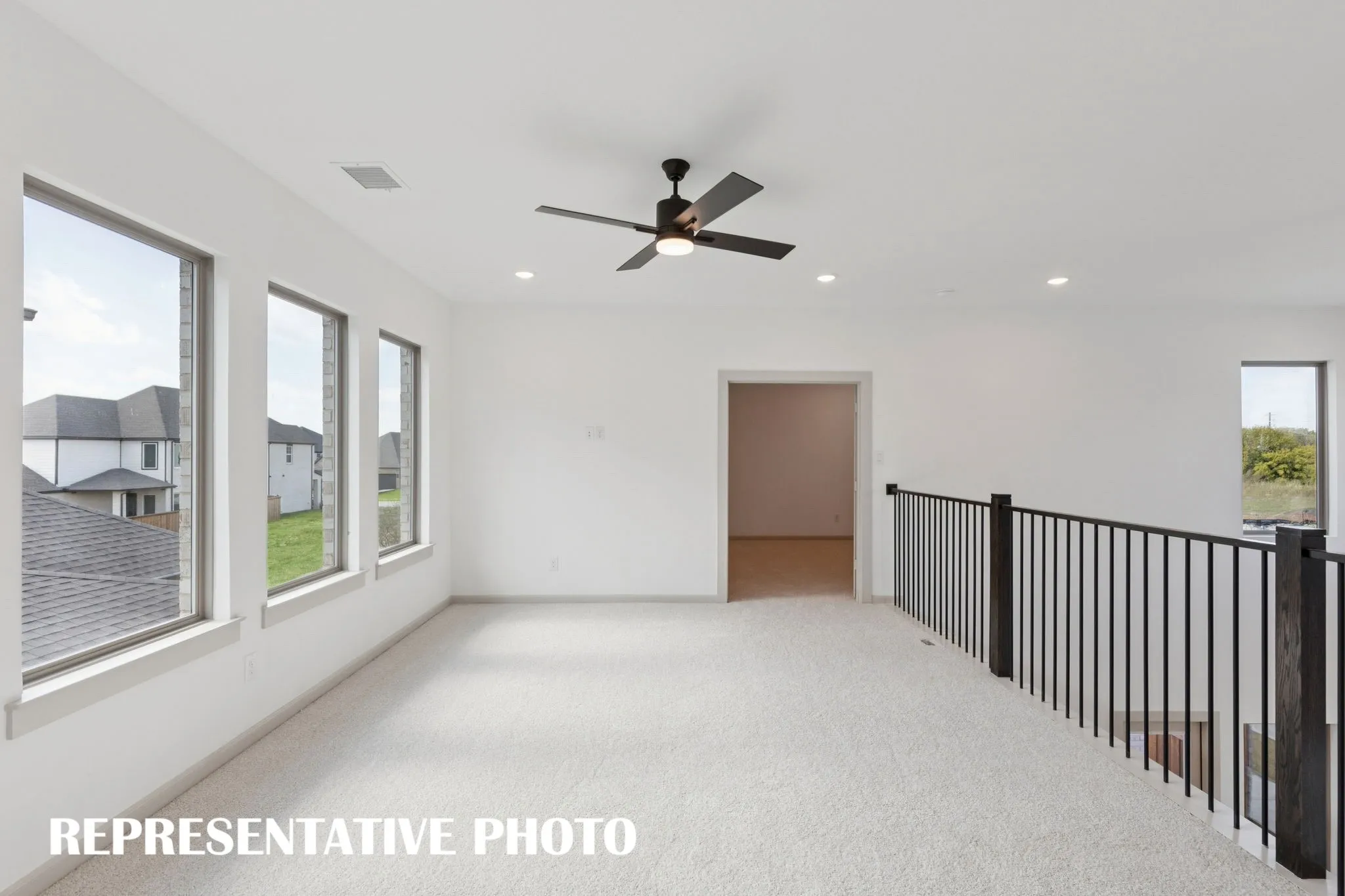 Entertaining is a breeze in this spacious, light filled game room!  REPRESENTATIVE PHOTO