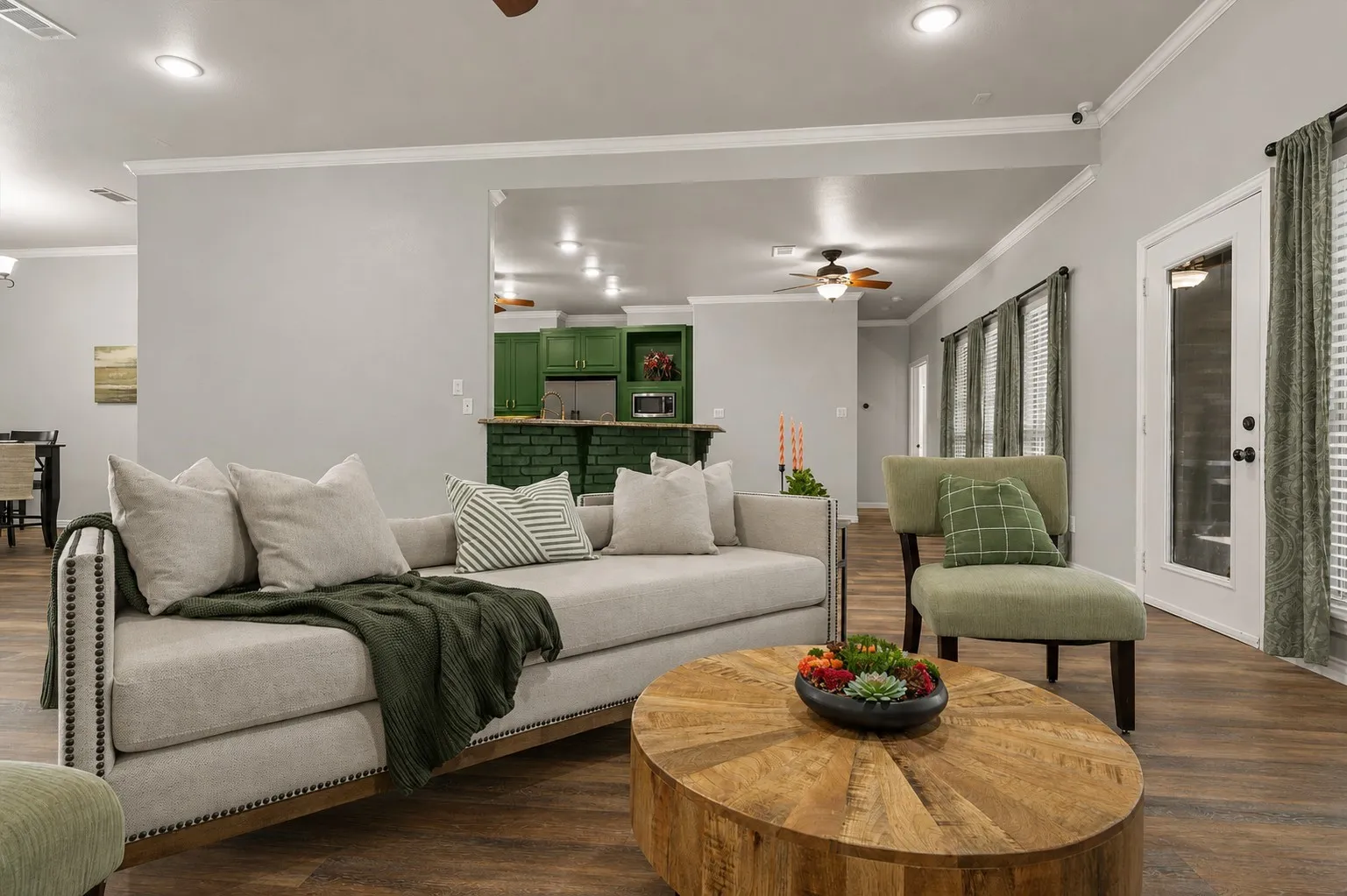 Wood-finish flooring throughout, recessed lighting, and crown molding