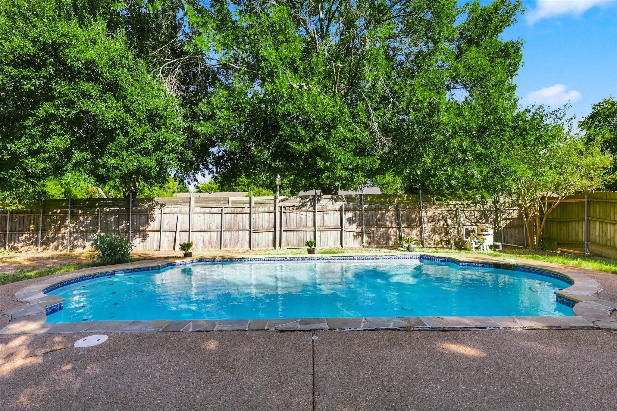 Large in-ground chlorine pool with new surfacing in 2022 and pump replaced in 2025.