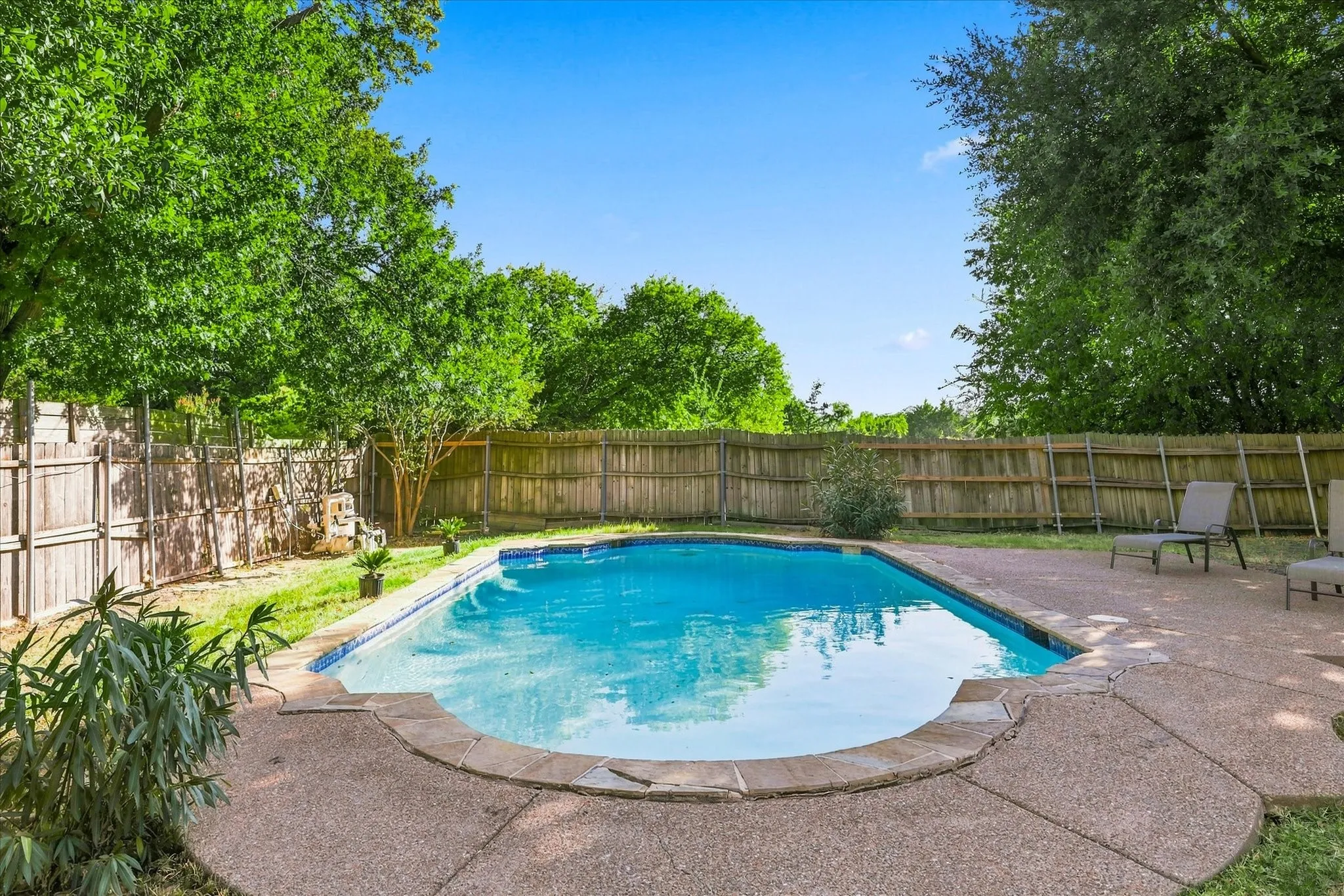 Large in-ground chlorine pool with new surfacing in 2022 and pump replaced in 2025.