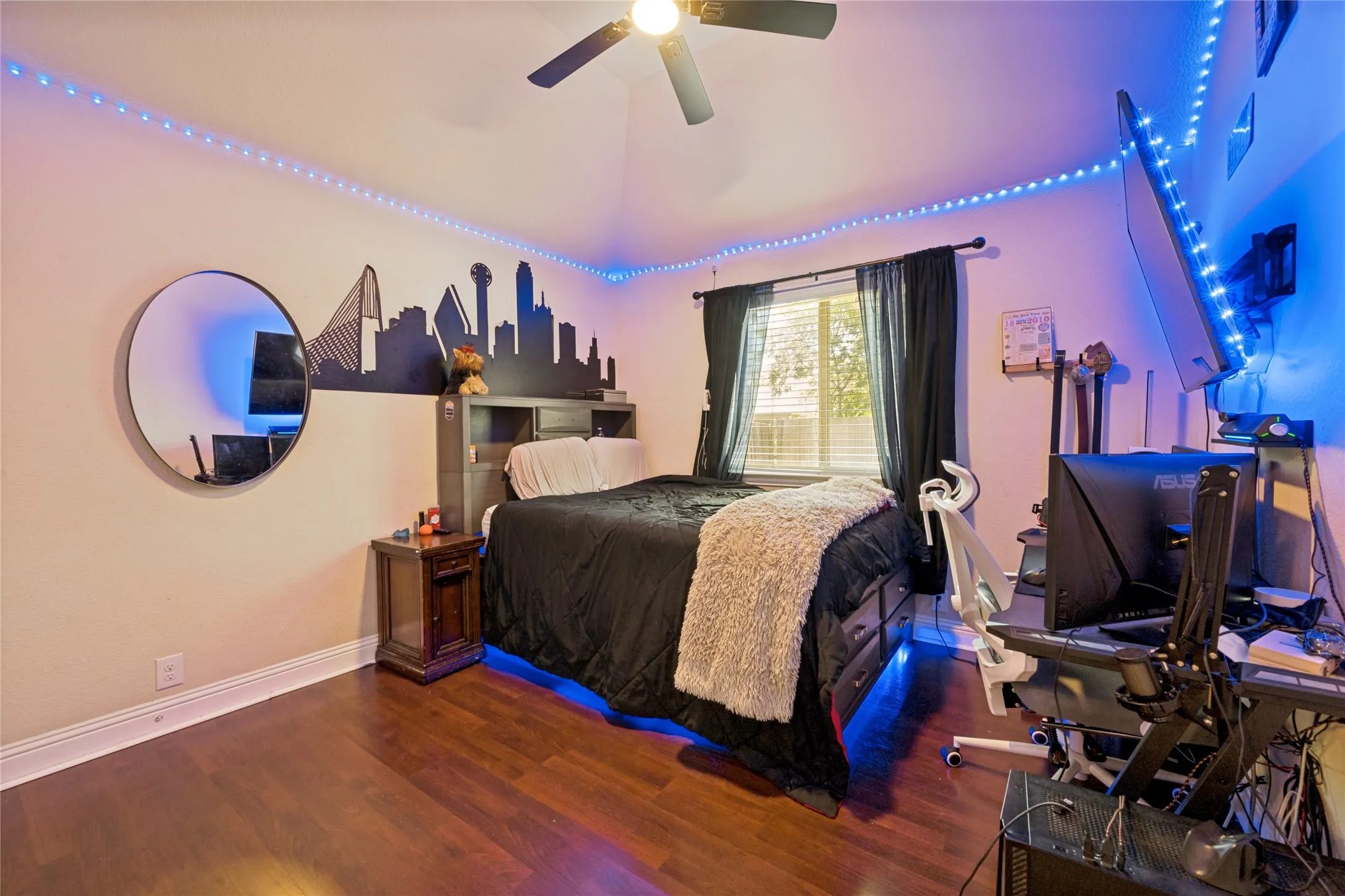 Blue accent lighting in this bedroom