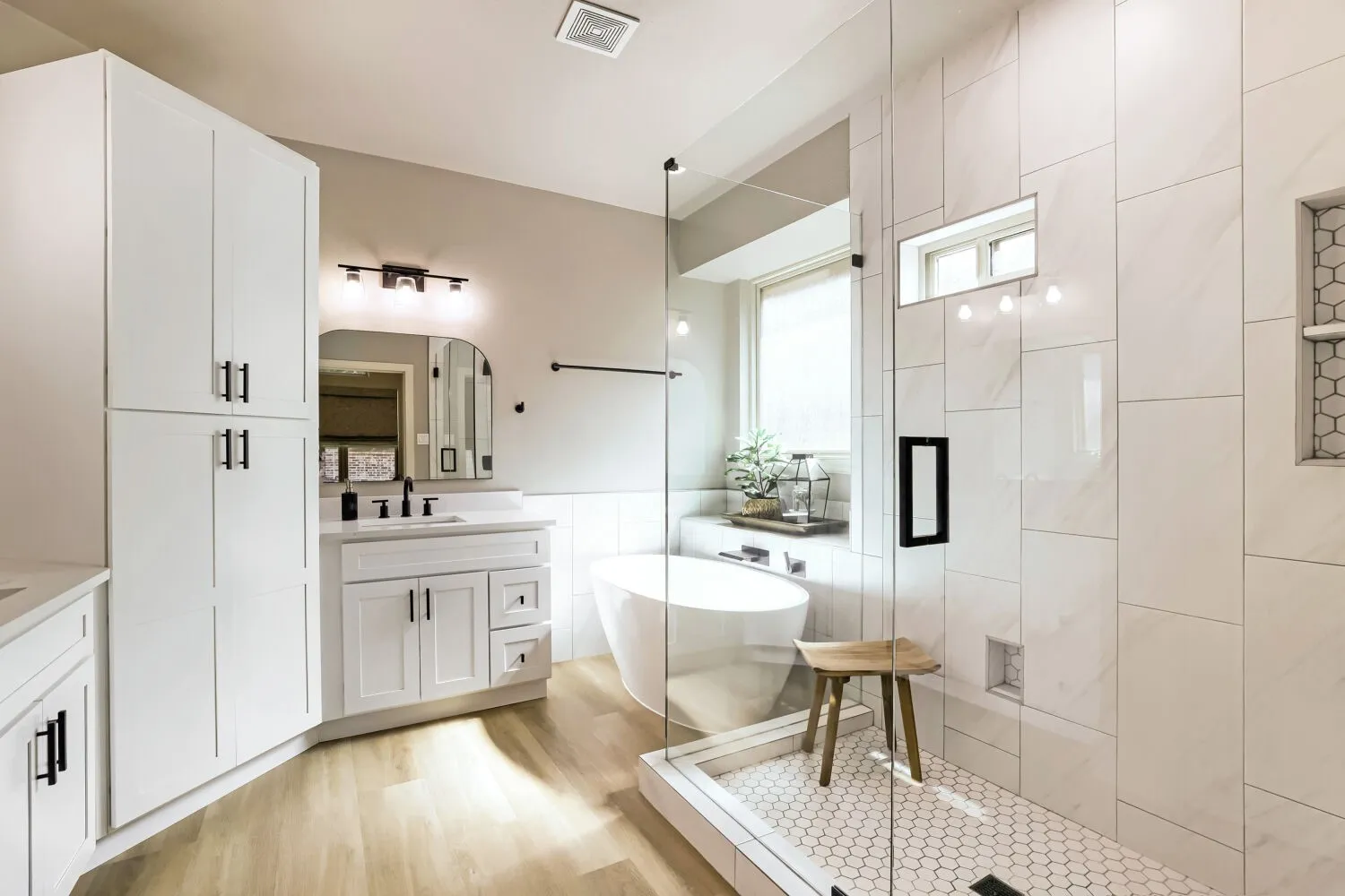 Features an expansive, custom-designed shower.