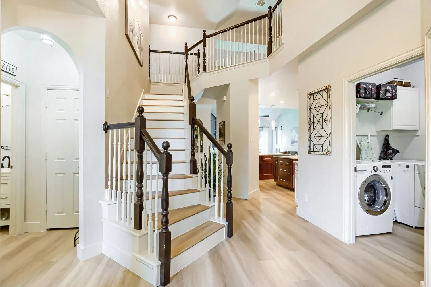 The central staircase provides a striking architectural focal point.