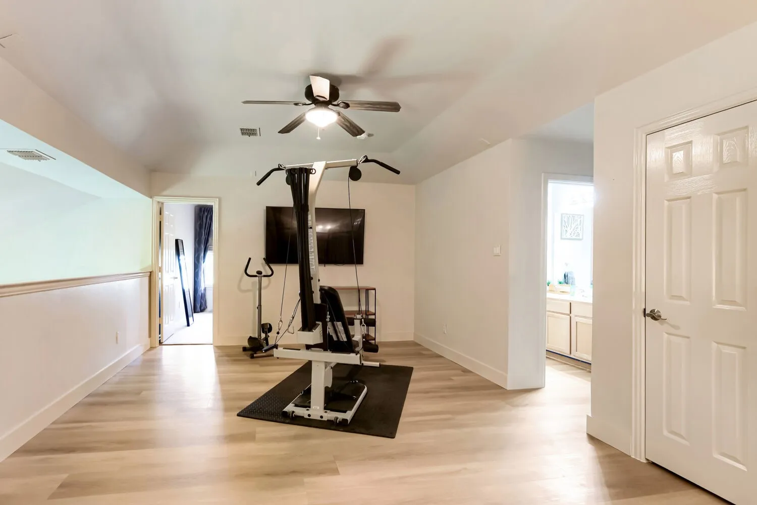 This versatile loft space offers endless possibilities, including a secondary living area, a game room, a children's play area, or a home gym.