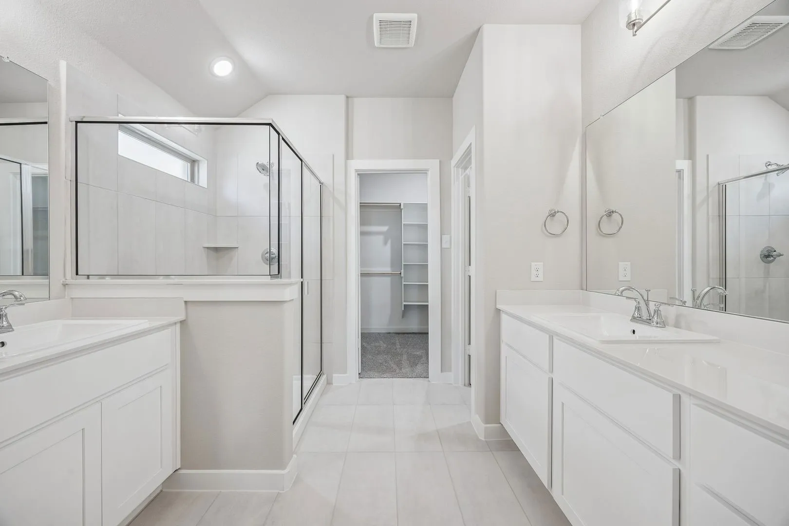 Primary Bathroom in the Heisman home plan by Trophy Signature Homes – REPRESENTATIVE PHOTO