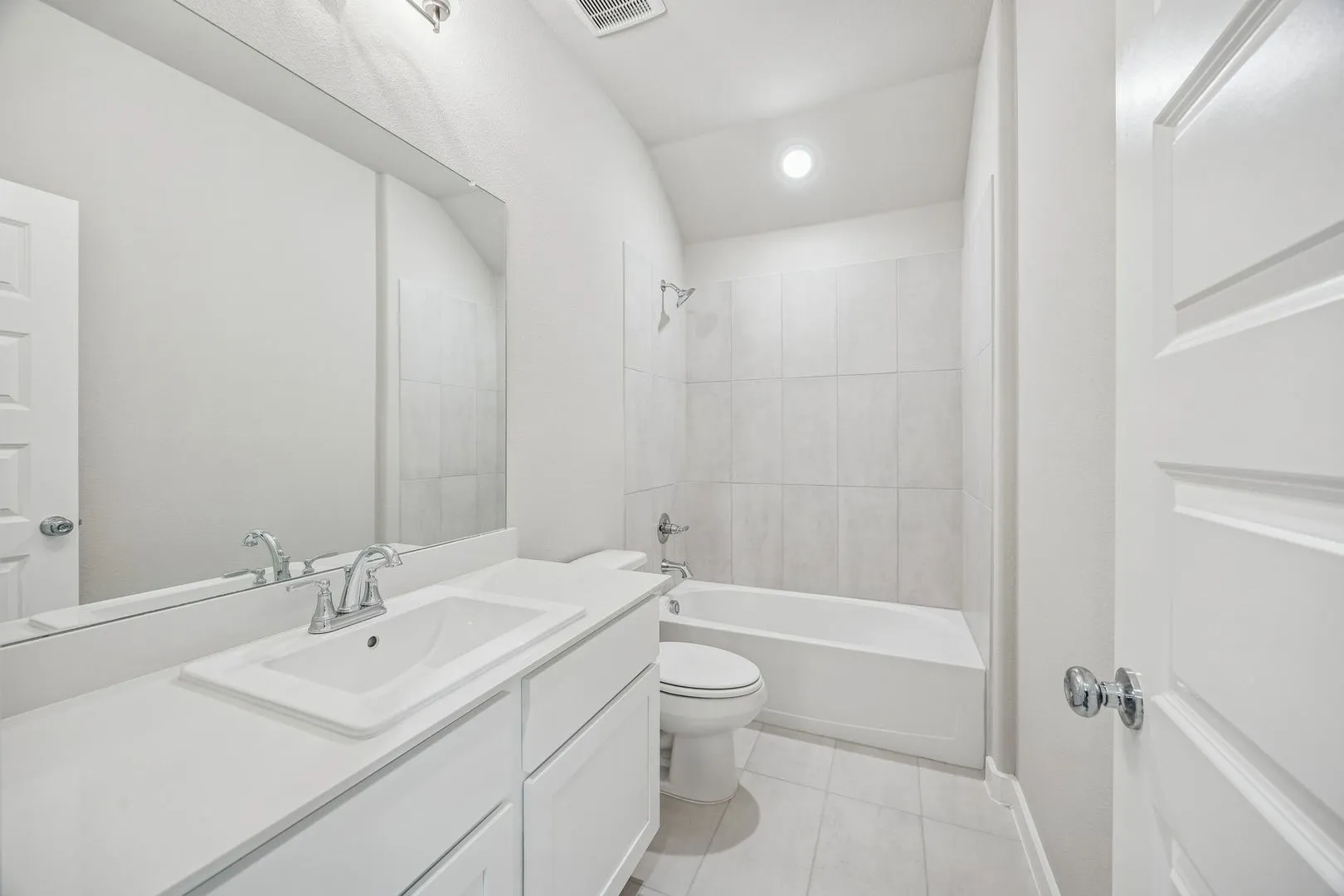 Bathroom in the Heisman home plan by Trophy Signature Homes – REPRESENTATIVE PHOTO