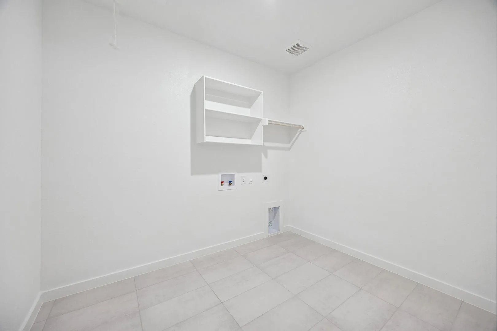 Utility Room in the Heisman home plan by Trophy Signature Homes – REPRESENTATIVE PHOTO