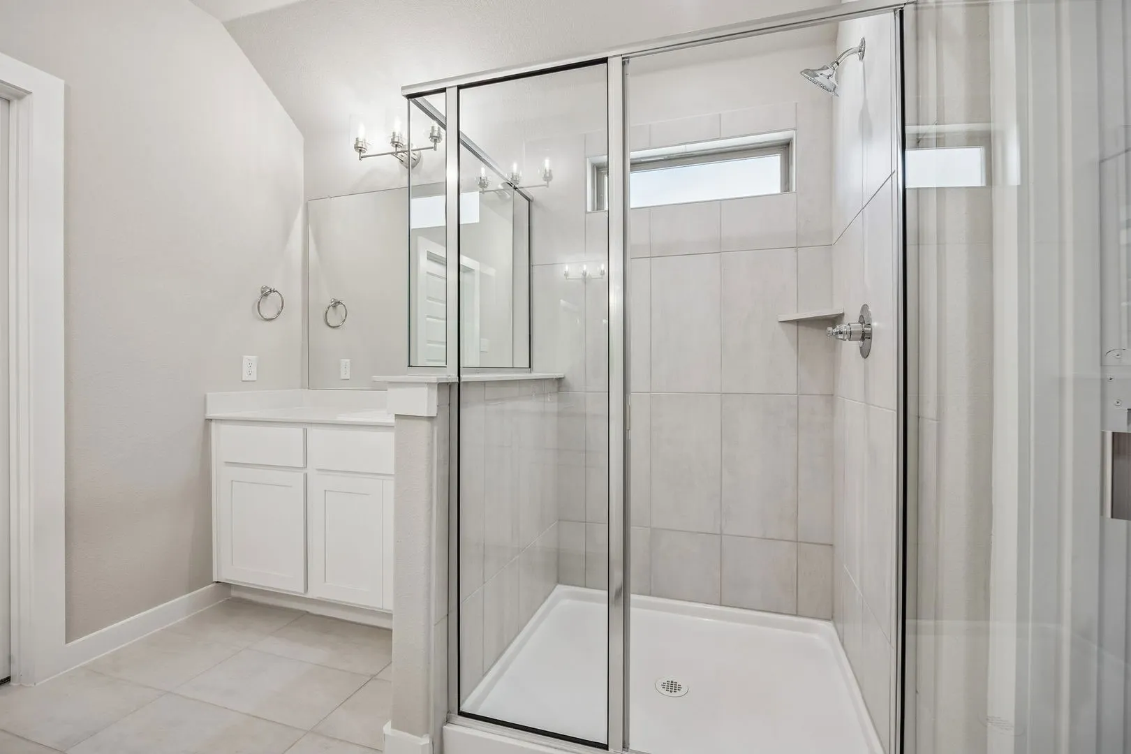 Primary Bathroom in the Heisman home plan by Trophy Signature Homes – REPRESENTATIVE PHOTO
