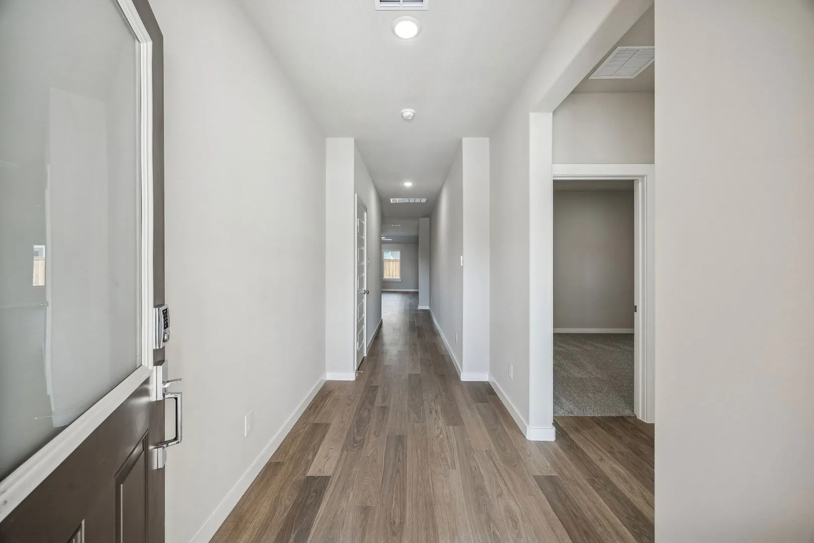 Entryway in the Heisman home plan by Trophy Signature Homes – REPRESENTATIVE PHOTO
