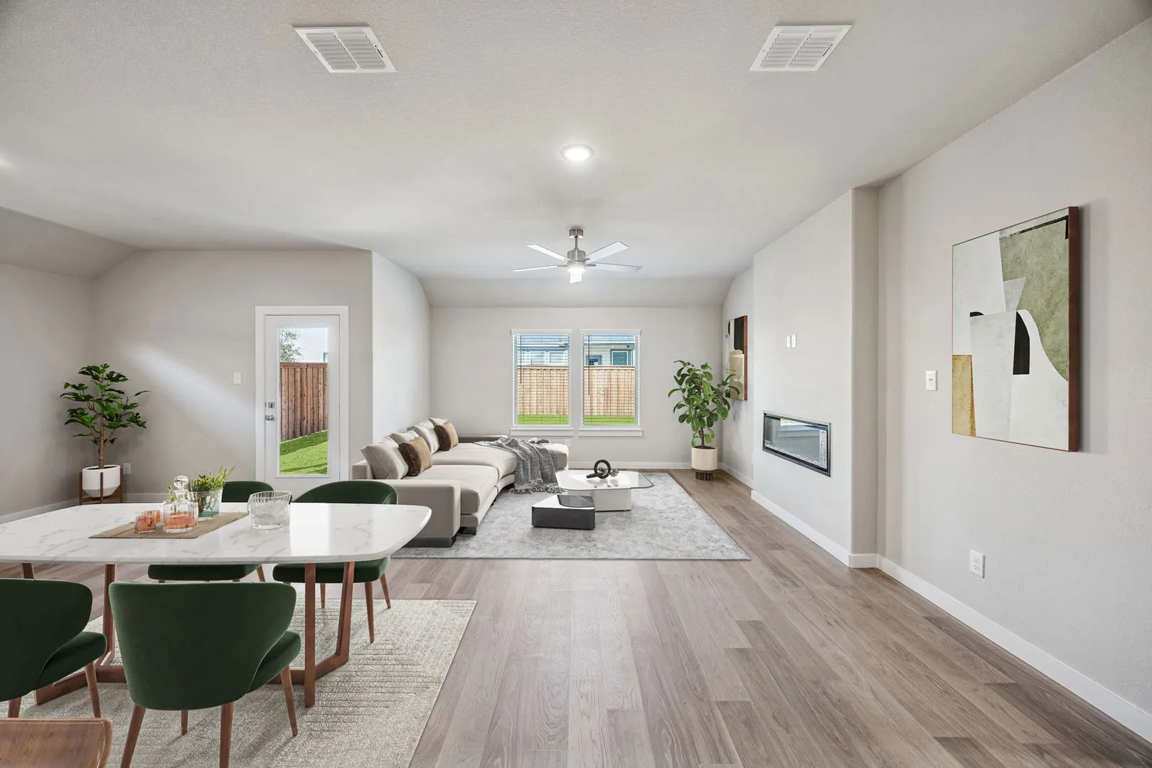 Living and Dining Room in the Heisman home plan by Trophy Signature Homes – REPRESENTATIVE PHOTO