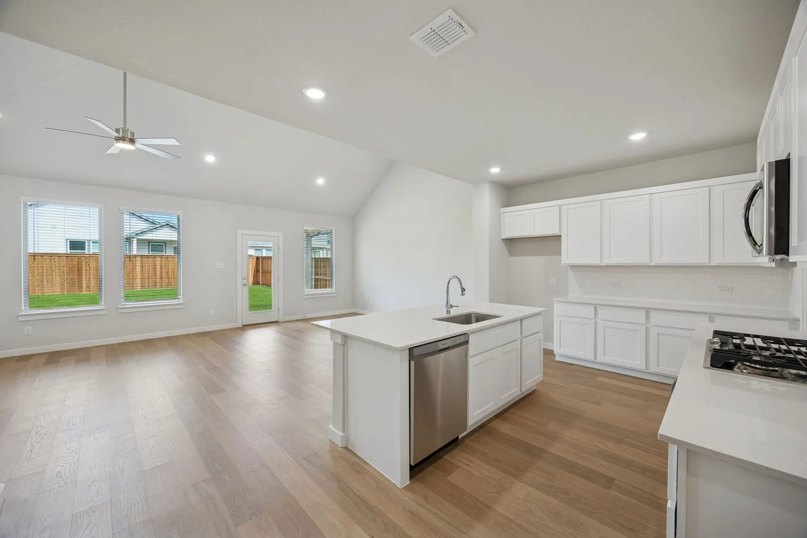 Open First Floor in the Masters home plan by Trophy Signature Homes – REPRESENTATIVE PHOTO