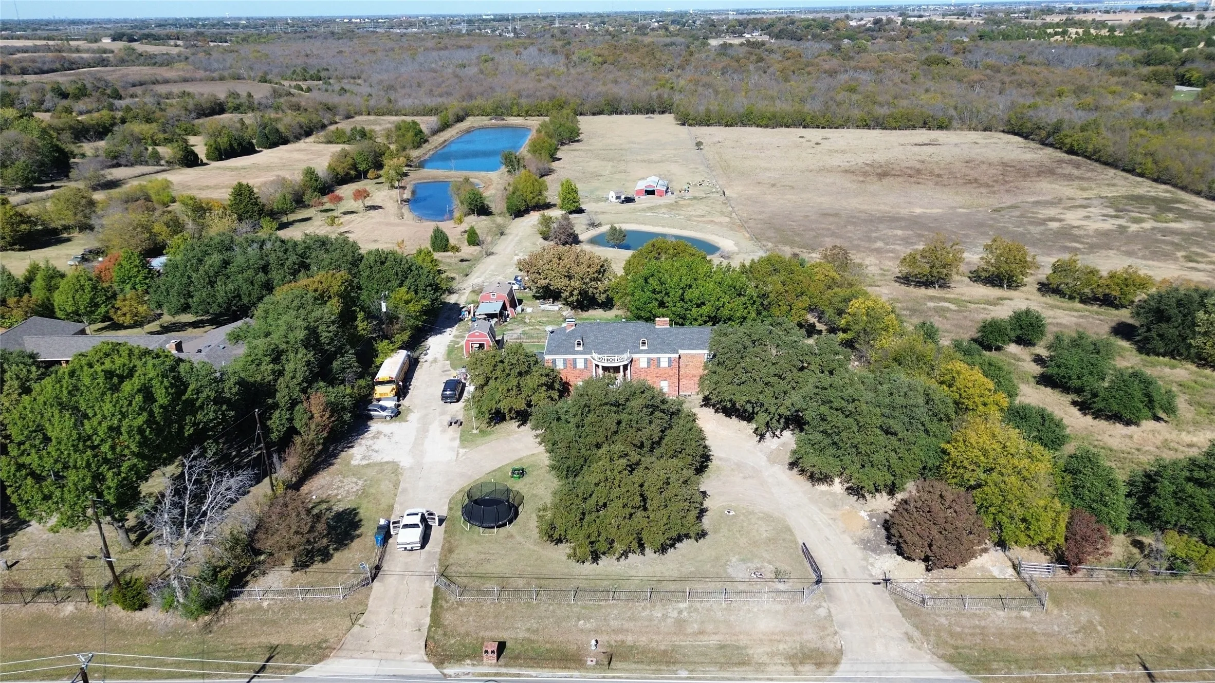 Aerial view of property's location with a nearby body of water