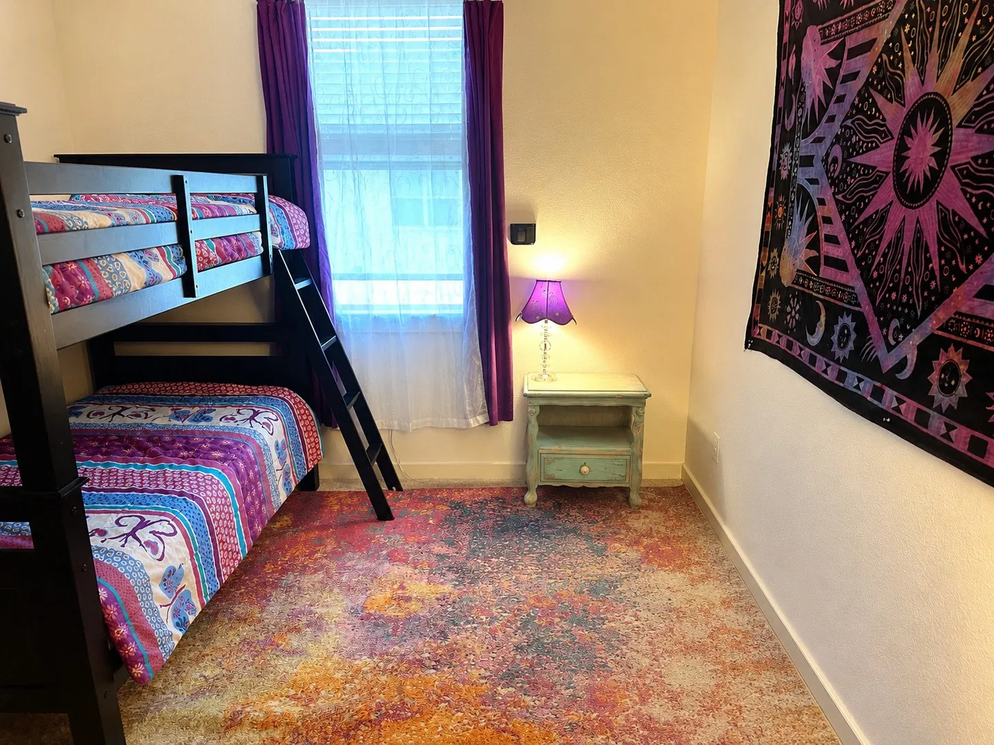 Bedroom: Window and carpet flooring. Digitally decluttered.