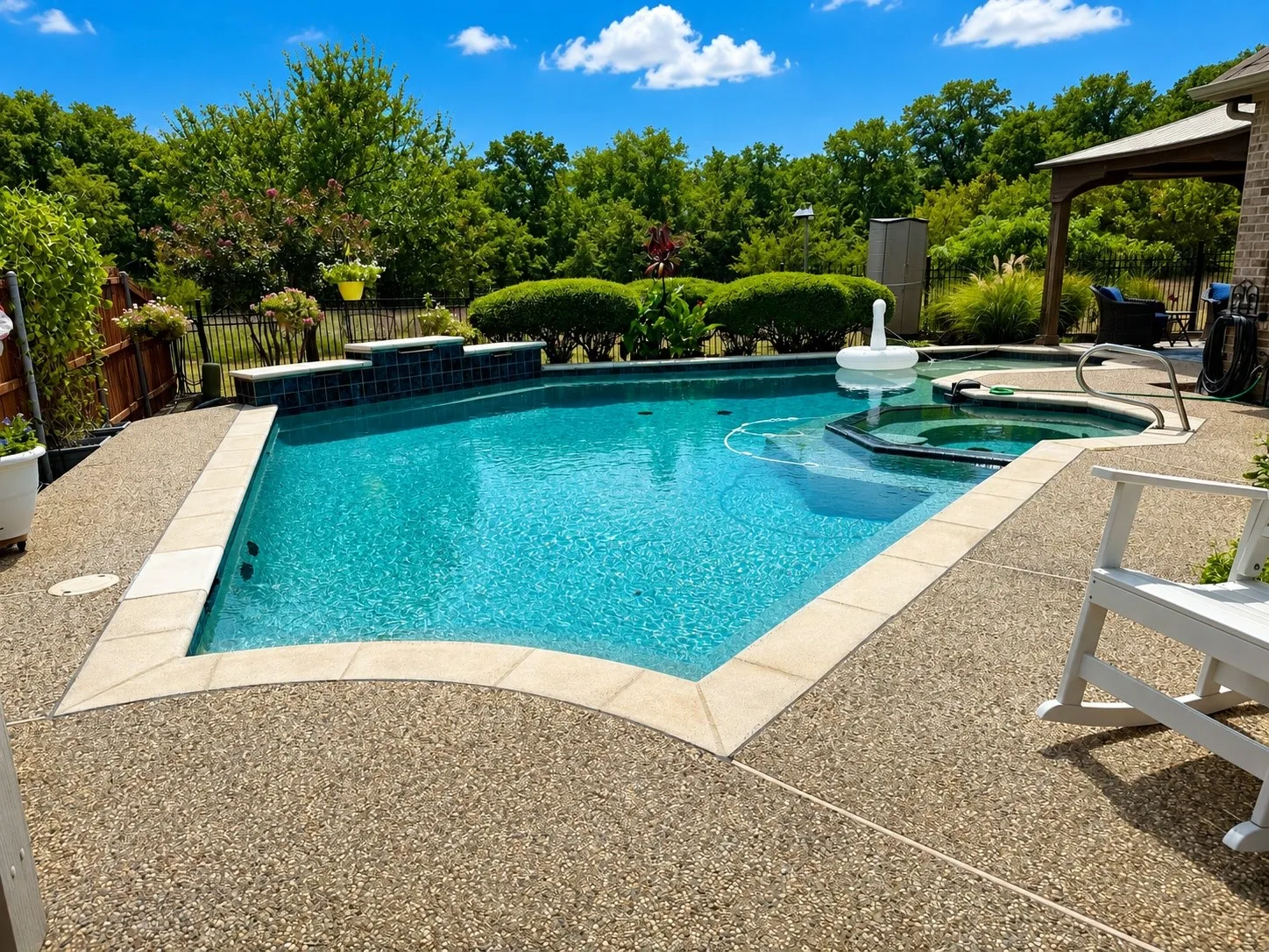 Resort style pool with spa, and view of the Pecan Creek Preserve. Watch the birds and nature from your private oasis.