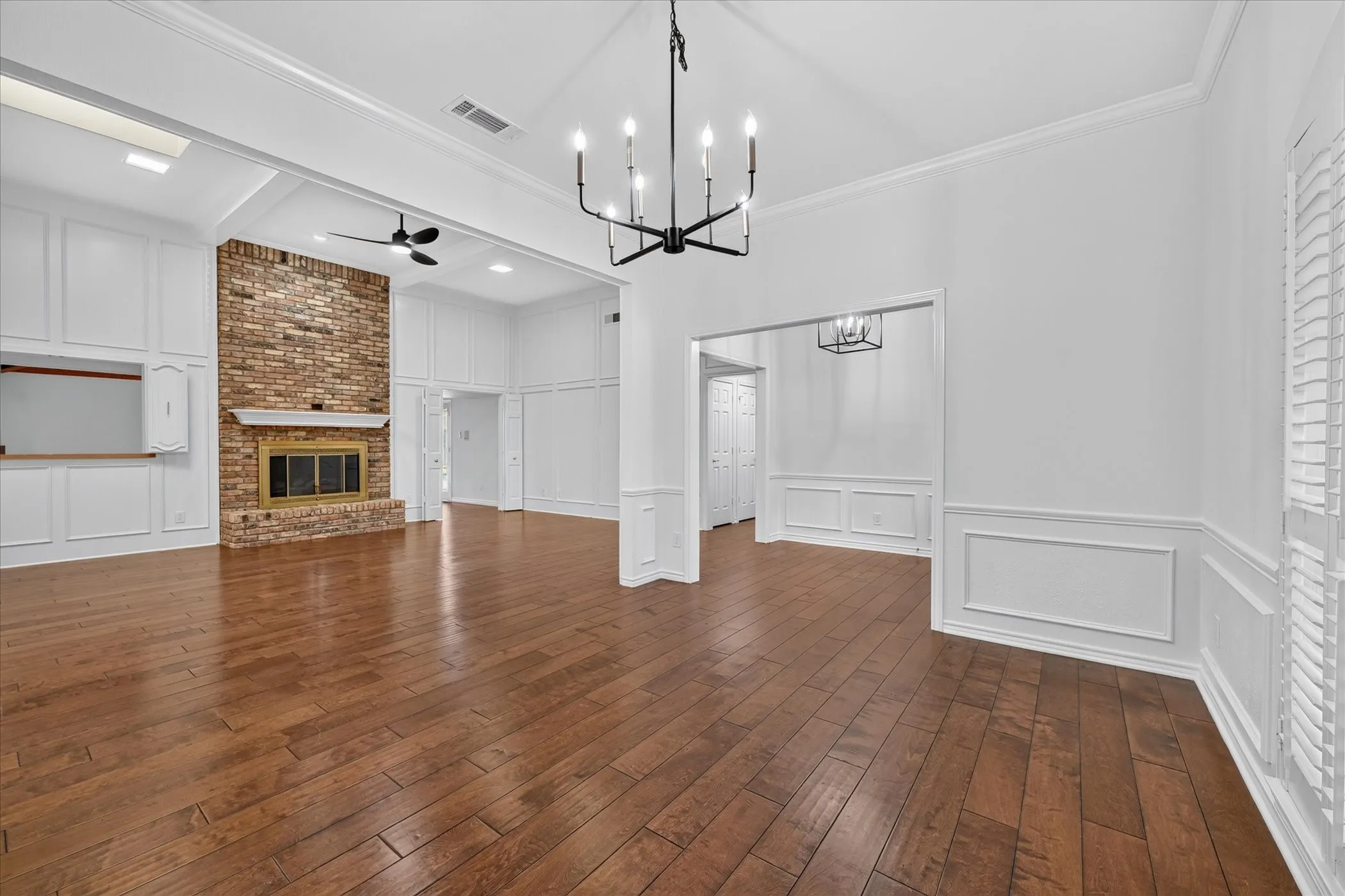 plantation shutters, wood-finish flooring
