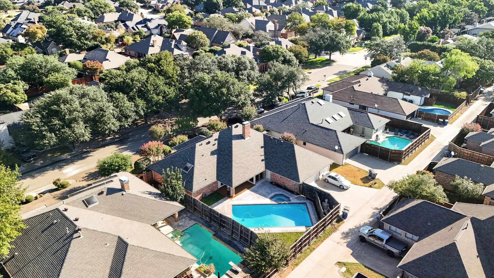 Property with private swimming pool, fenced backyard, and established neighborhood setting