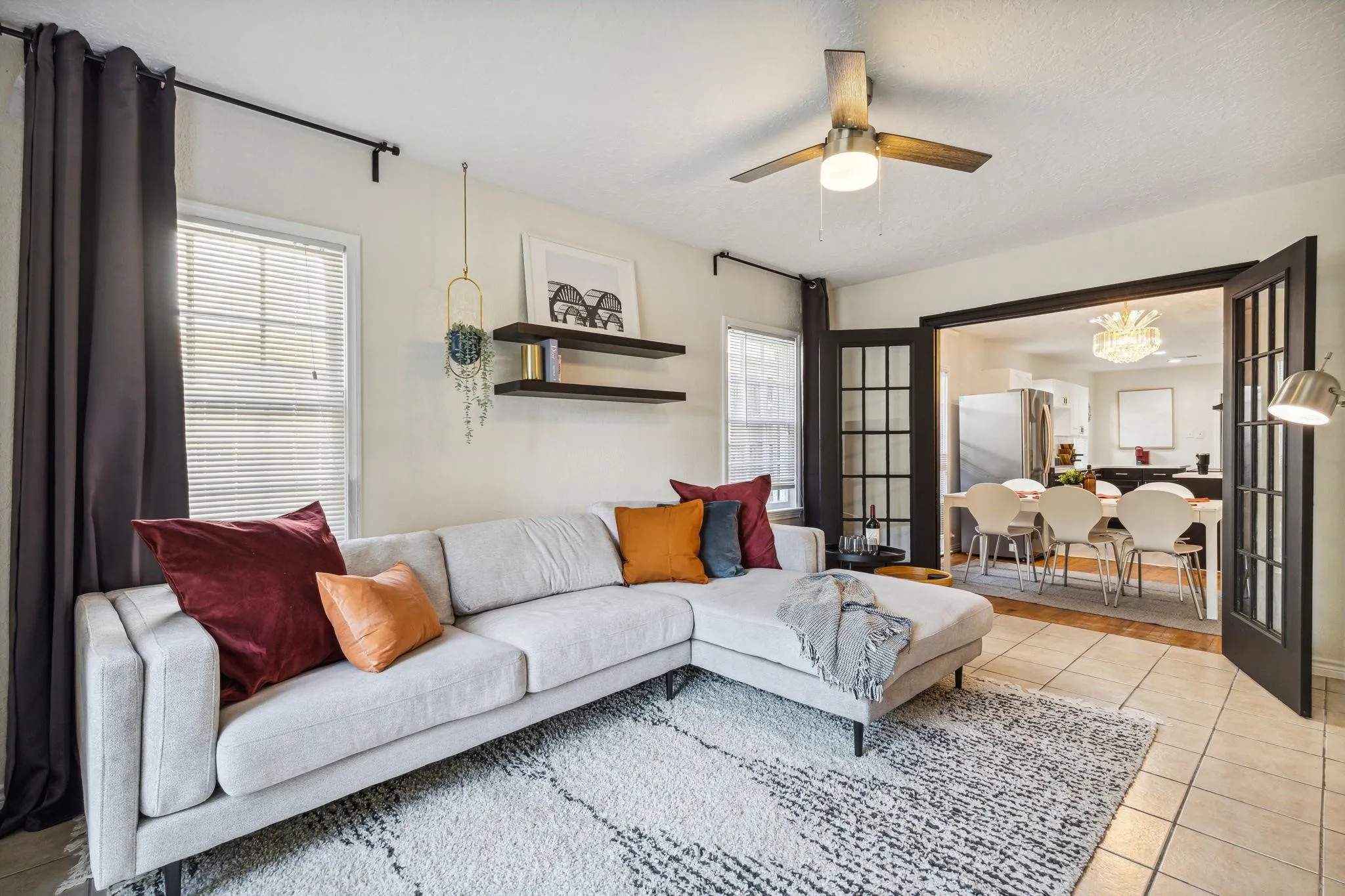 Recessed lighting, ceiling fan with integrated light, tiled flooring, built-in shelving, and French doors