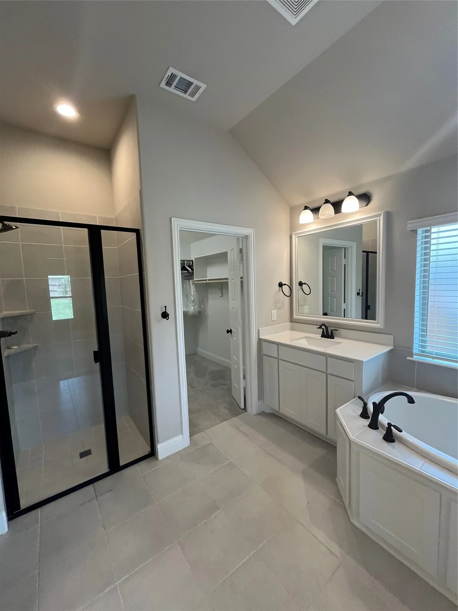 PRIMARY TUB AND SHOWER