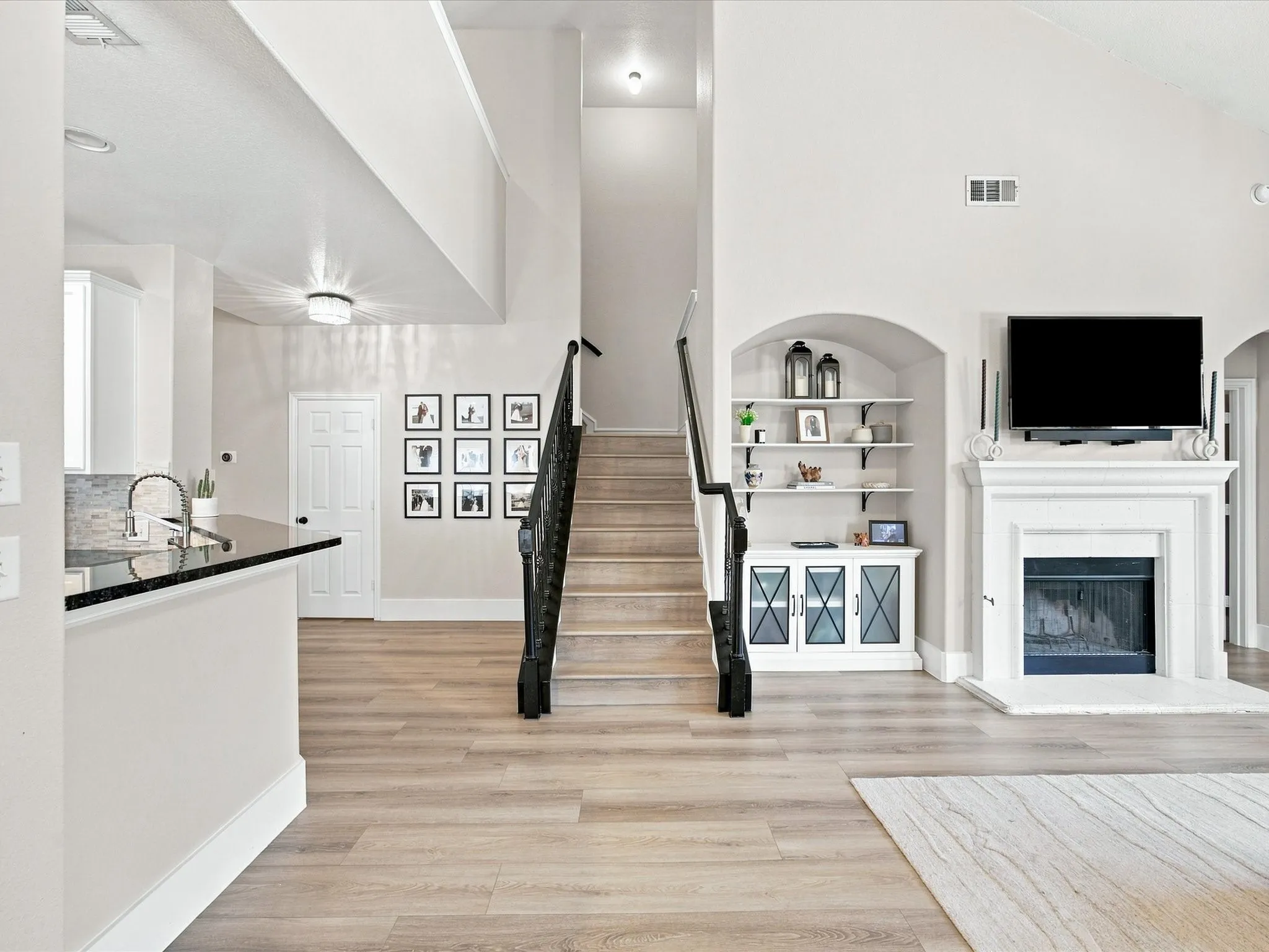 Inviting stair case leads you to the secondary floor of this immaculant home!
