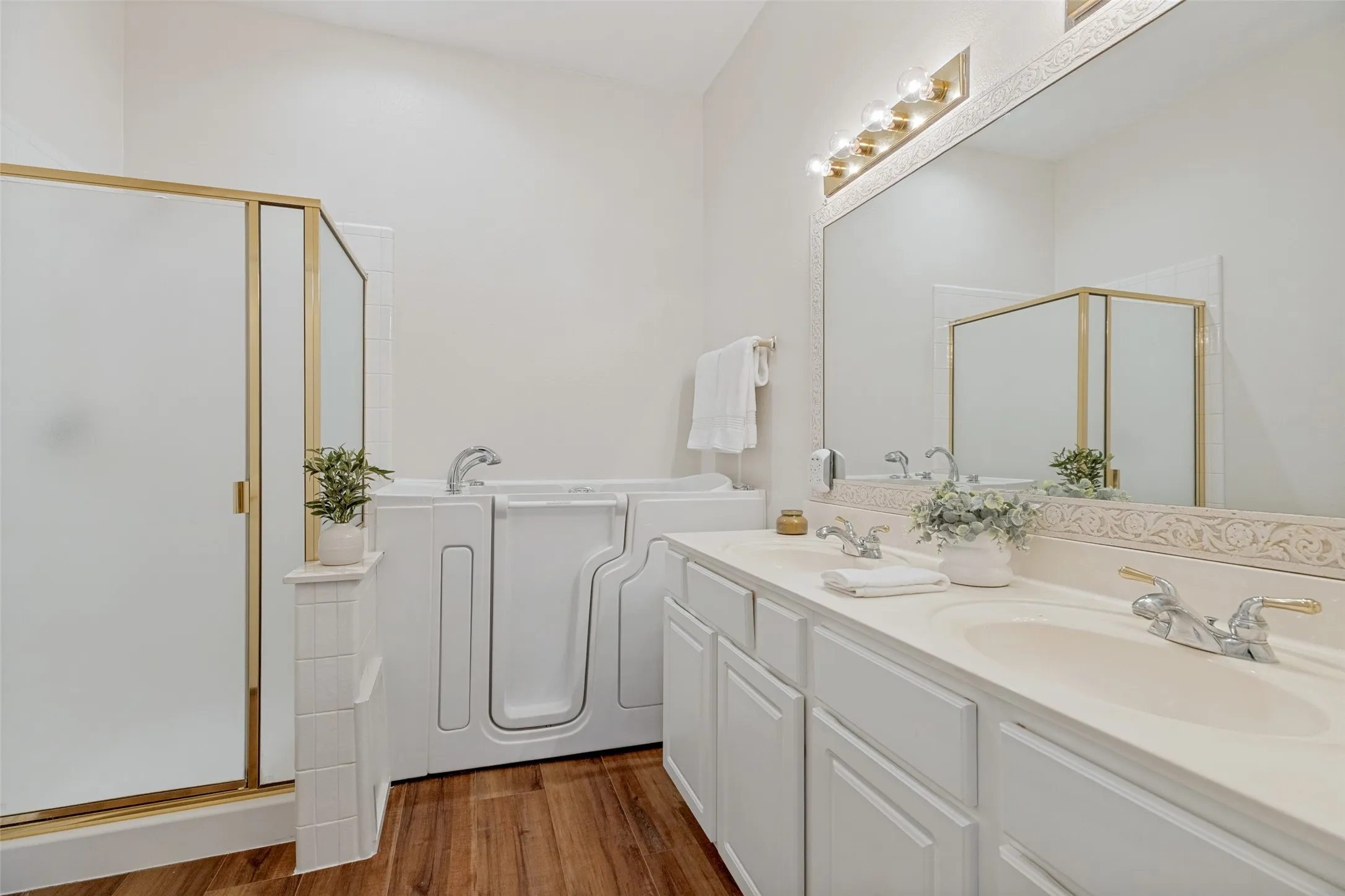 Primary Bathroom with Dual Sinks, Separate Shower and Walk-in Tub