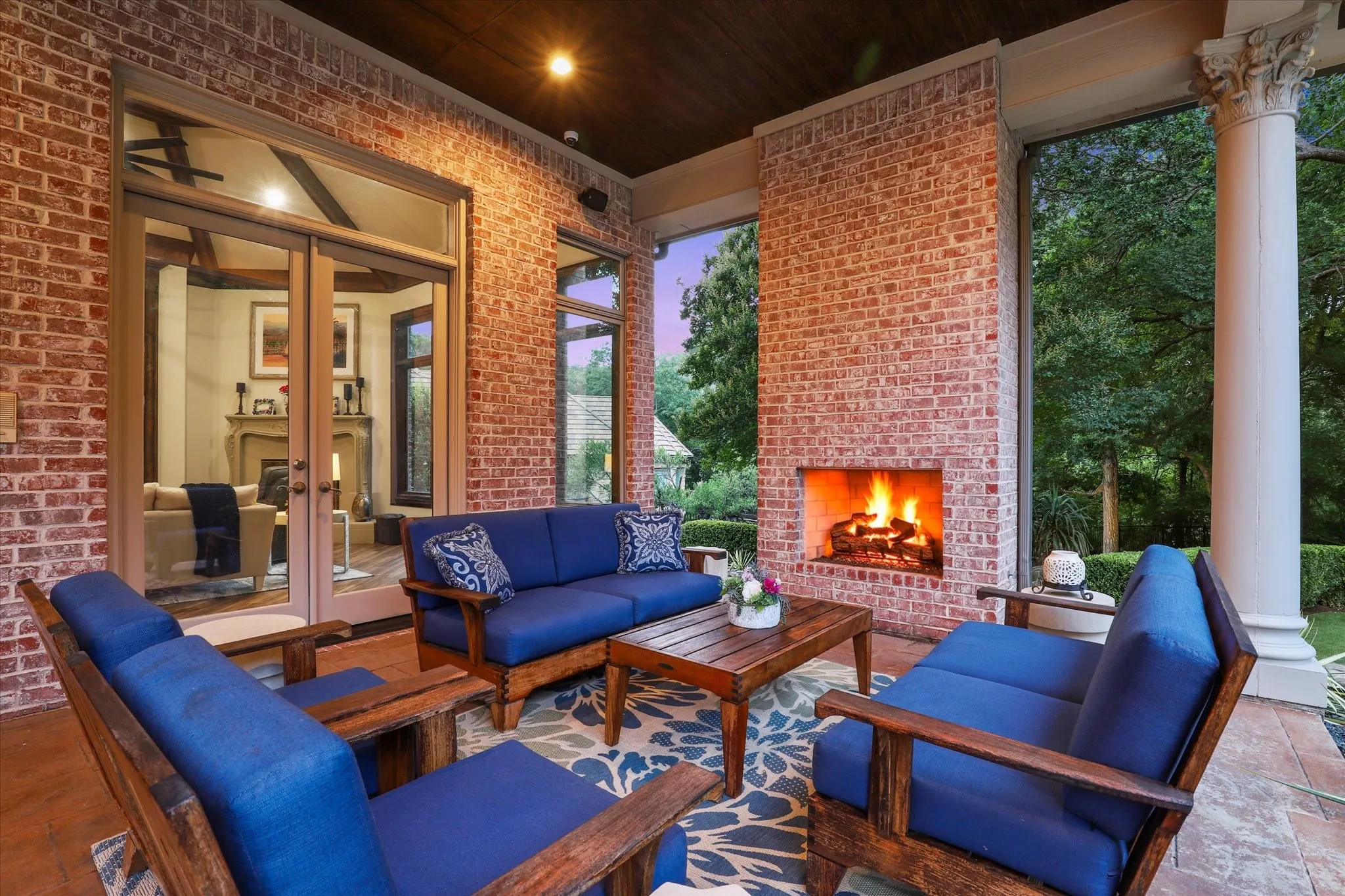 Enjoy cozy private evenings on  your covered patio with fireplace.