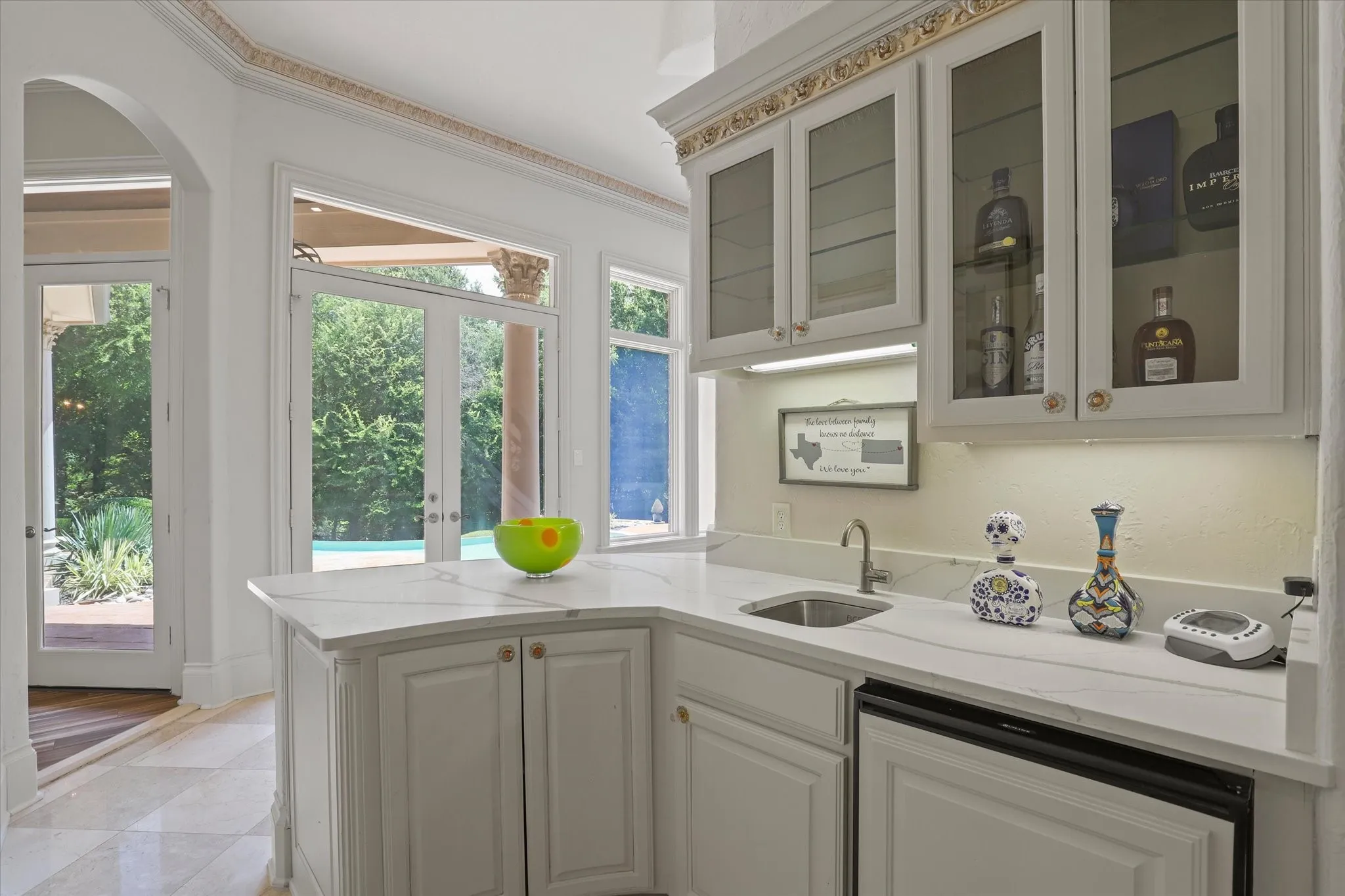The Wet Bar is conveniently located for access to the Kitchen, Family Room and Living and Dining Rooms.