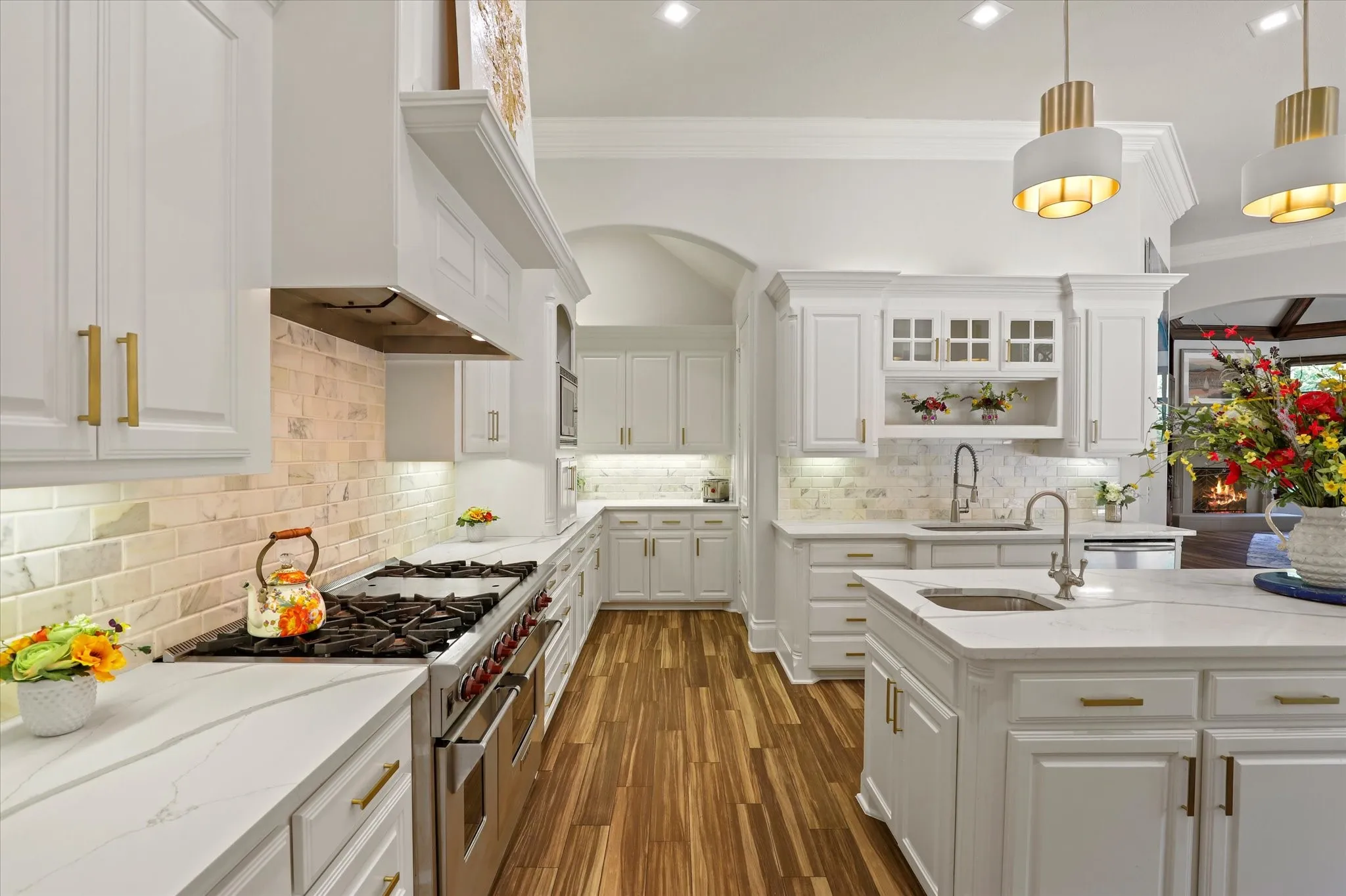 Updated lighting, fixtures, backspash and so much storage in this Kitchen!