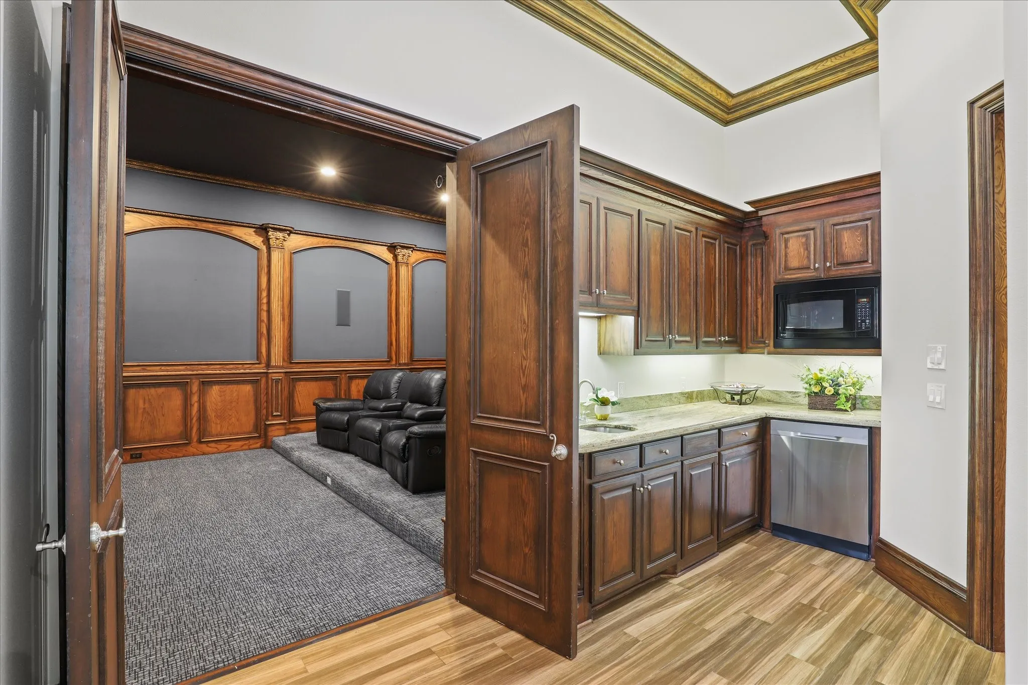 Just off the Family Room on the 1st floor is a 2nd Wet Bar/Kitchen area, a half bath (not shown) and The 1st floor Media Room!