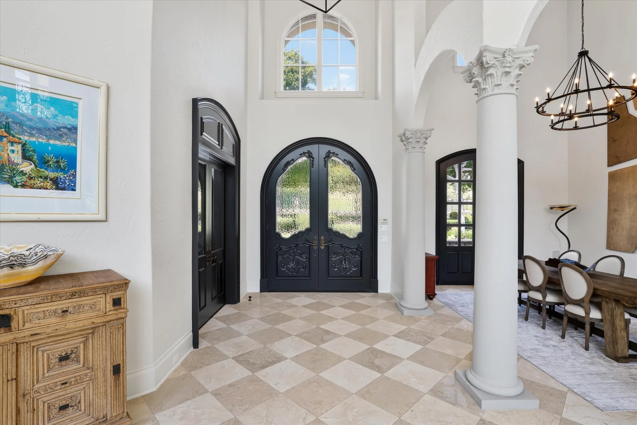 The Entry is beautiful and shows the Den and Office on one side and the Dining Room on the other.
