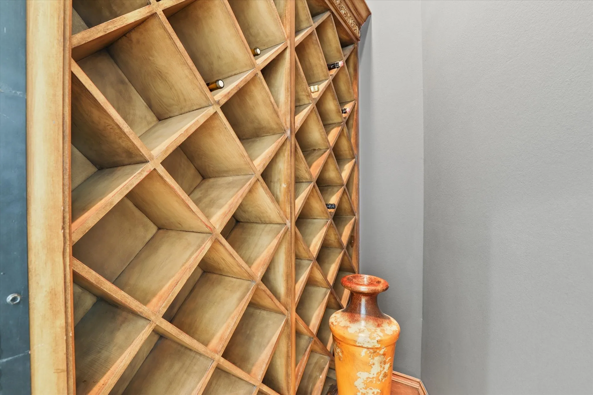 Wine cellar is on the 1st floor just across from dry bar and around the corner from the wet bar.