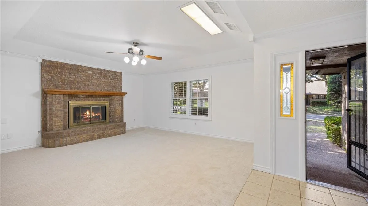 Step into the entry with a view of the living room.