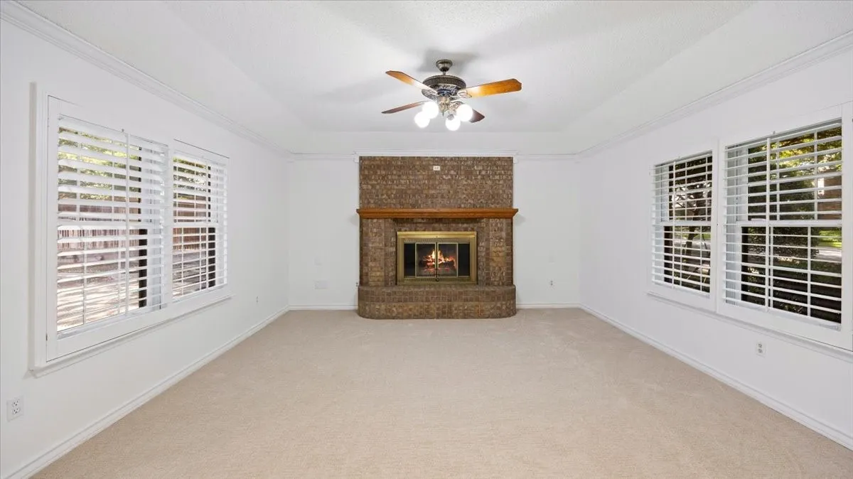 Brick wood-burning fireplace.