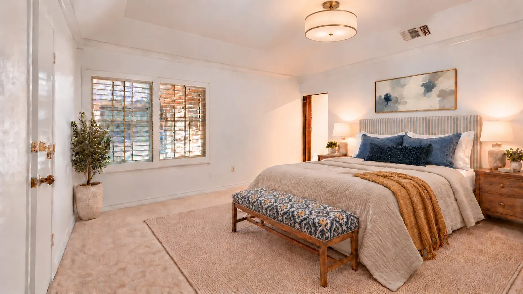 Primary bedroom, digitally staged.