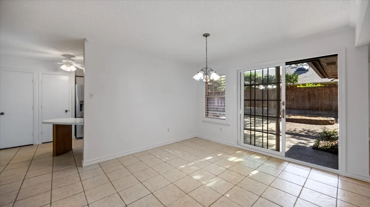 Dining area with sliding doors to back patio.