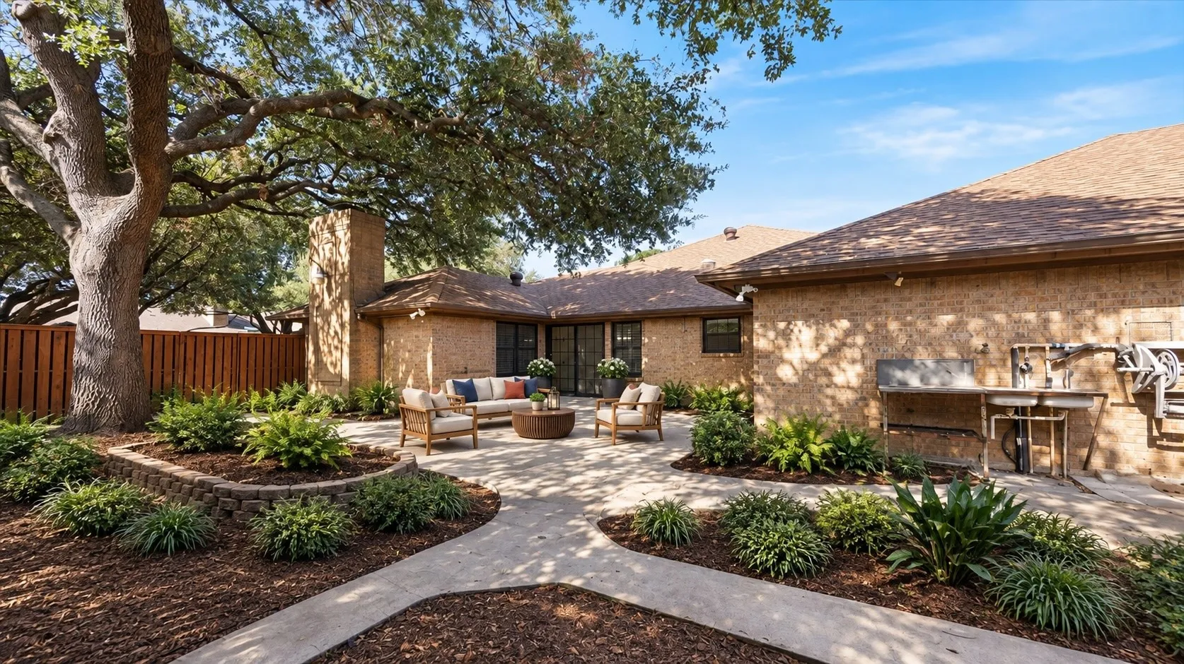 Back yard and patio, digitally staged and landscaped.