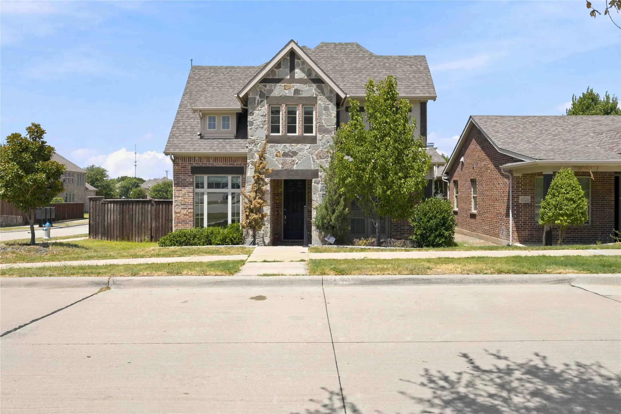 Stone and brick exterior with a gabled roof