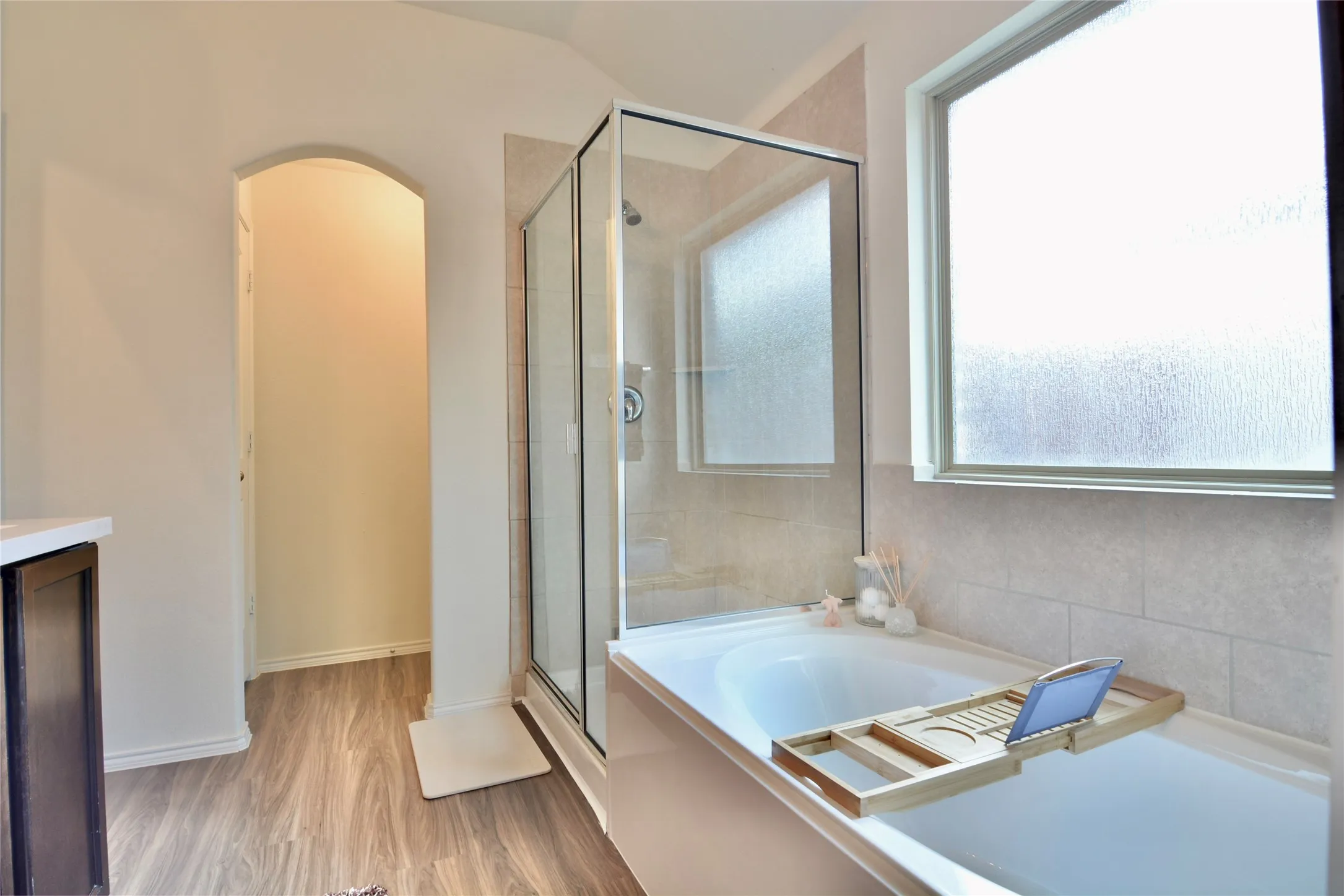Light and bright primary bathroom