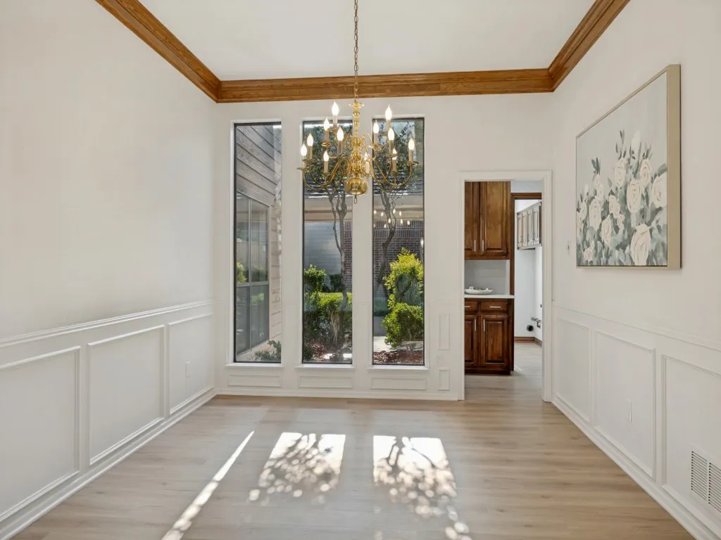 This dining room overlooking the courtyard is lovely. Come see it!