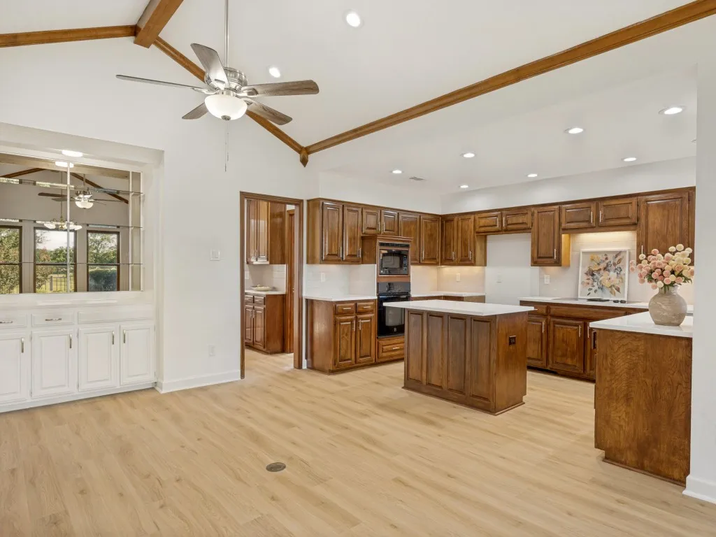 Family room offers dry bar area and butlers pantry.