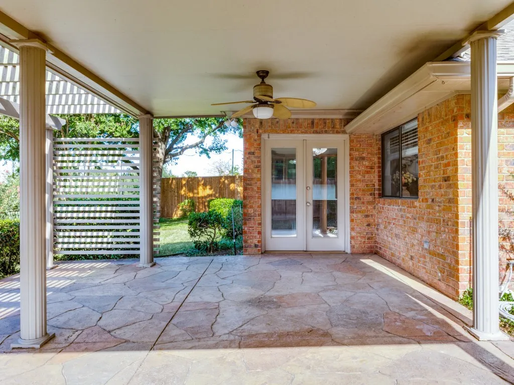 Large covered patio meticulously maintained, great for entertaining.