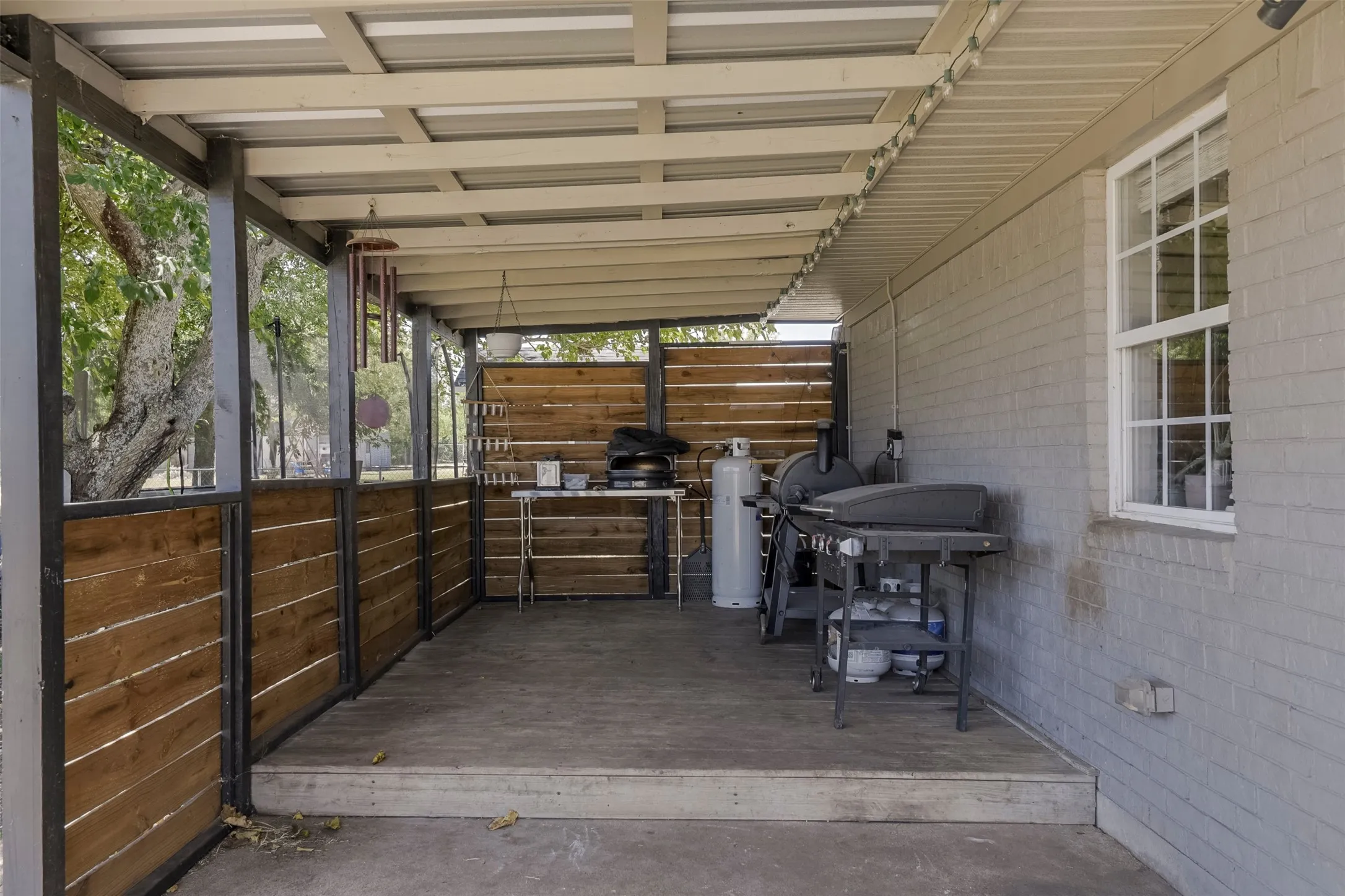 Covered back patio ready for some grilling!