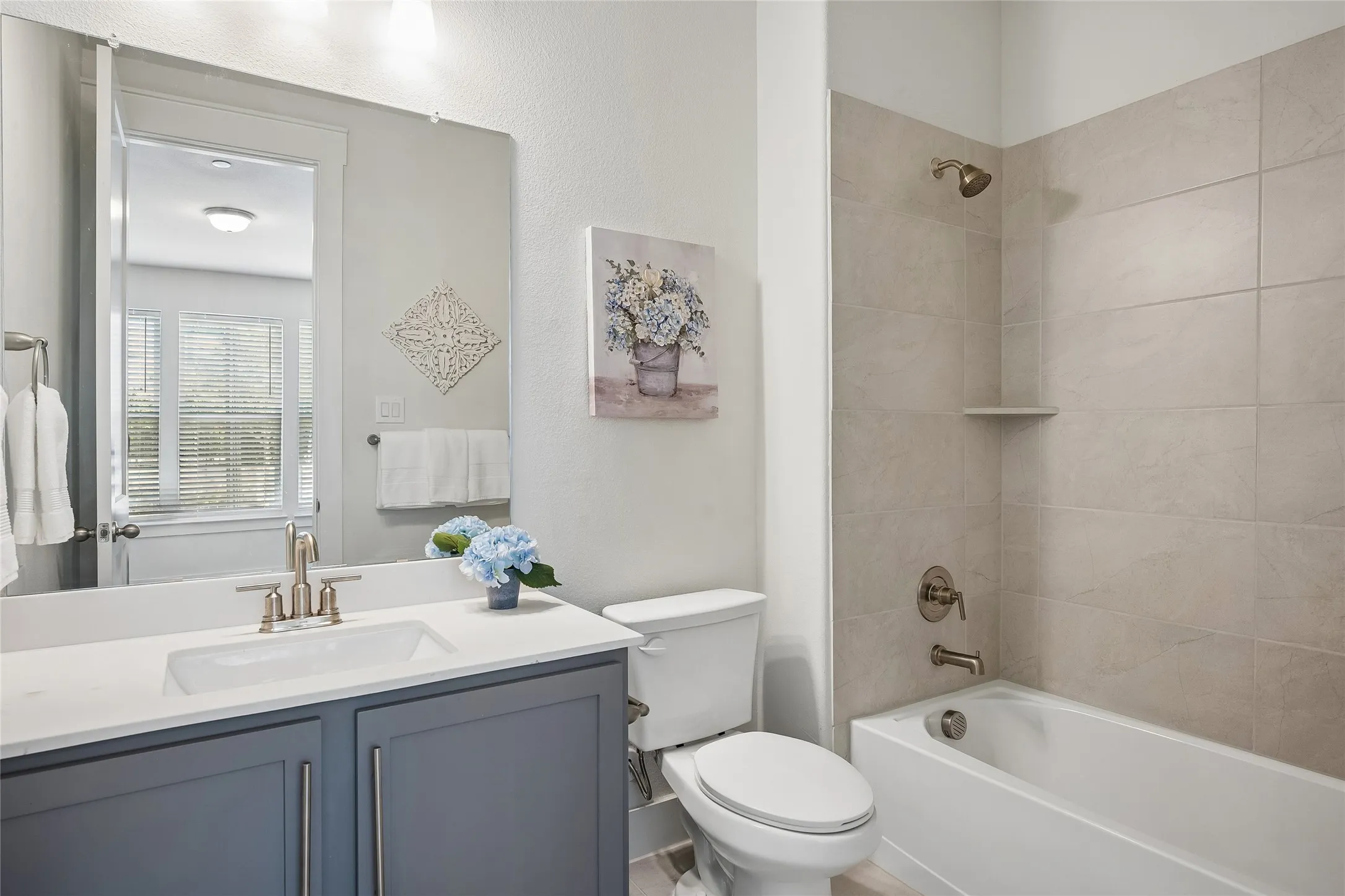 En-suite bath for entry level bedroom