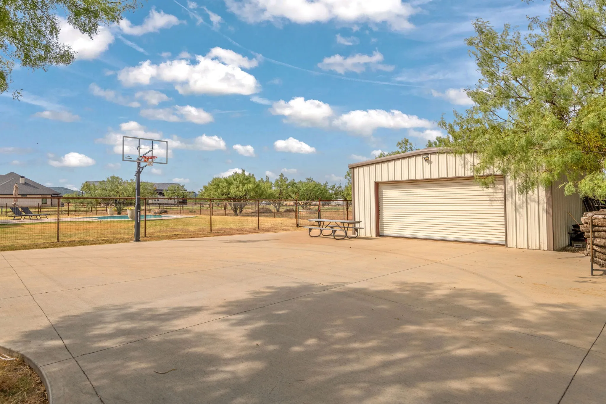 Concreted area in front of workshop allows for multiple uses.... even a game of hoops!