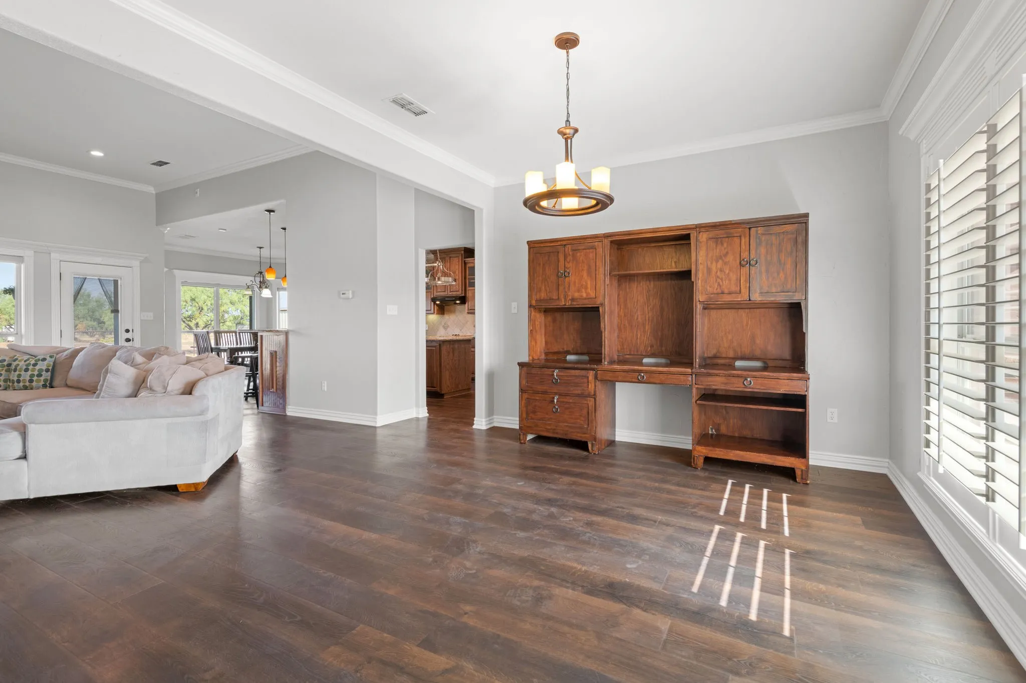 Dining area flows into the adjacent living room.