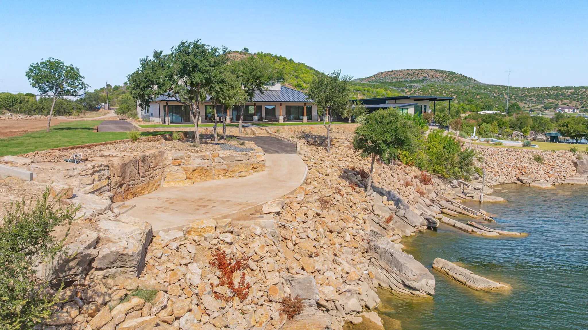 Single Family Residence For Sale in Palo Pinto County , 5417 Stillwater LN, Possum Kingdom Lake, Texas 76450, 4 Bedroom, 5 Bathroom, 2 Garage spaces, 3,699 Sqft, built in 2026, Price $3,999,999, mls#21361249, Real Estate Agent in Possum Kingdom Lake, Homes For Sale in Palo Pinto county, Homes For Sale in Possum Kingdom Lake, Realtor in Possum Kingdom Lake Texas, Real Estate Brokerage Independent Realty Texas, Luminita Cordes Realtor