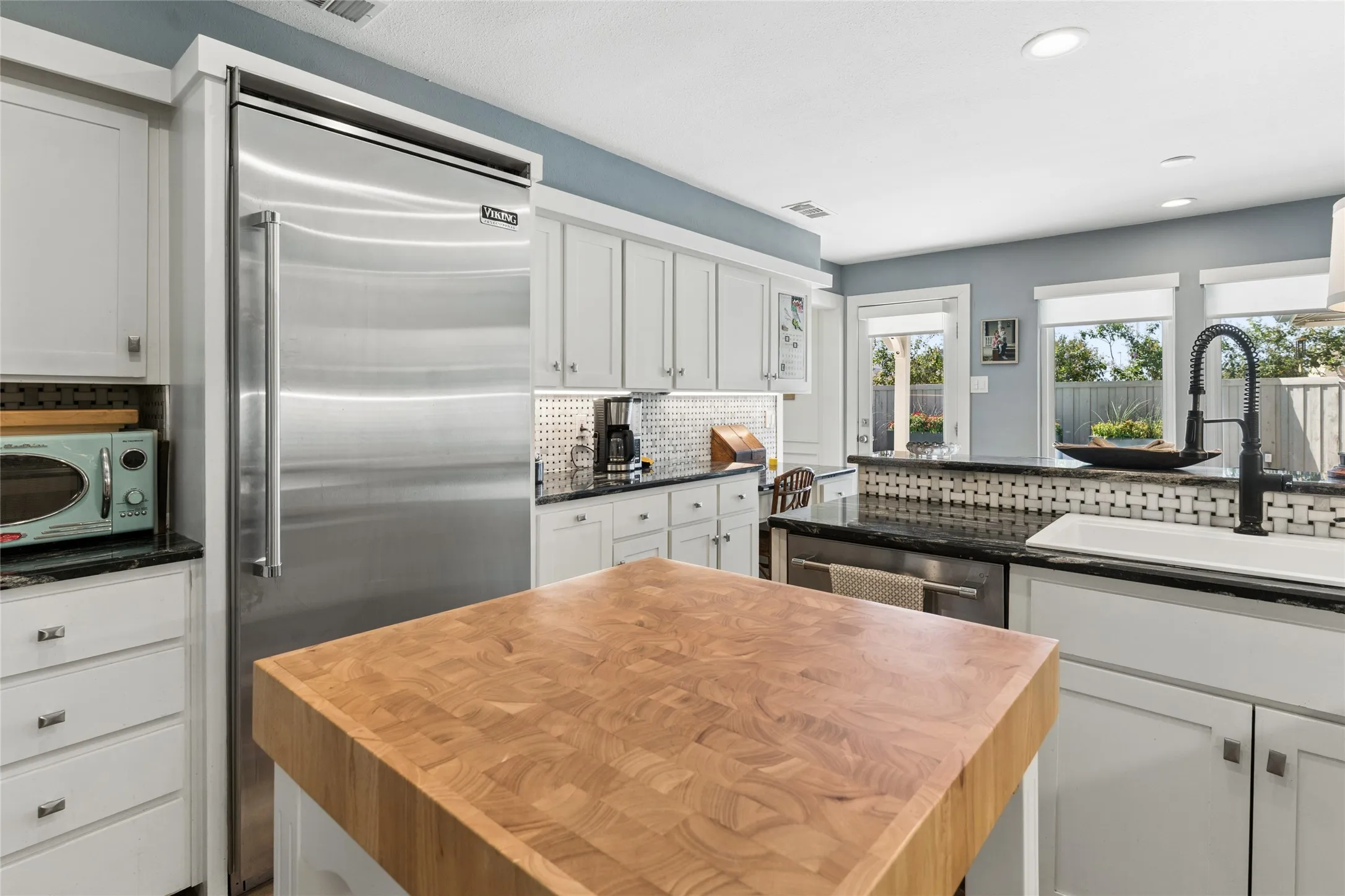 Looking towards the rear. Viking fridge, Fisher & Paykel, double-drawer dishwasher
